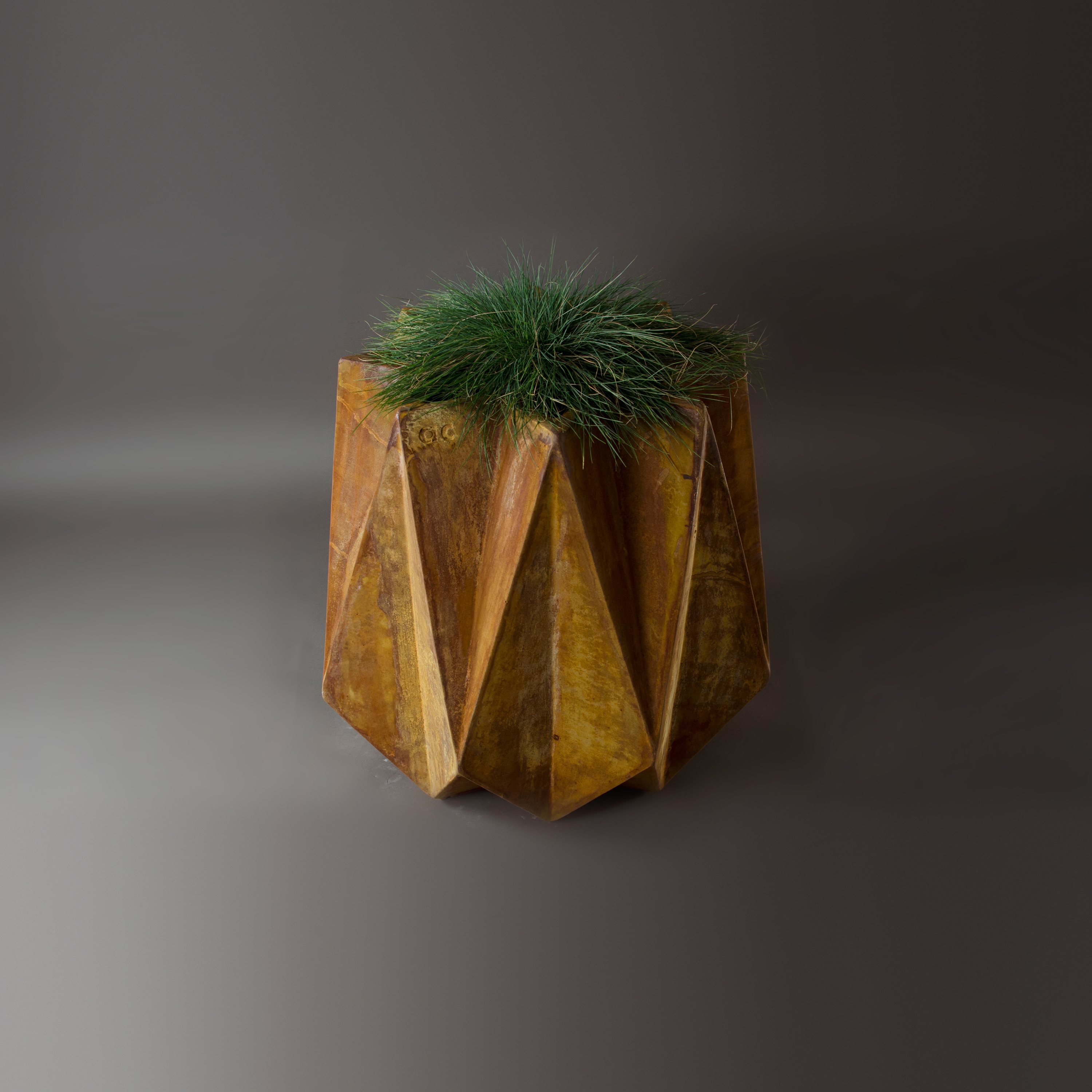 Display product Kronen 65 Flower Pot, Rust Stained Reinforced Concrete from manufacturer Adam Christopher Design