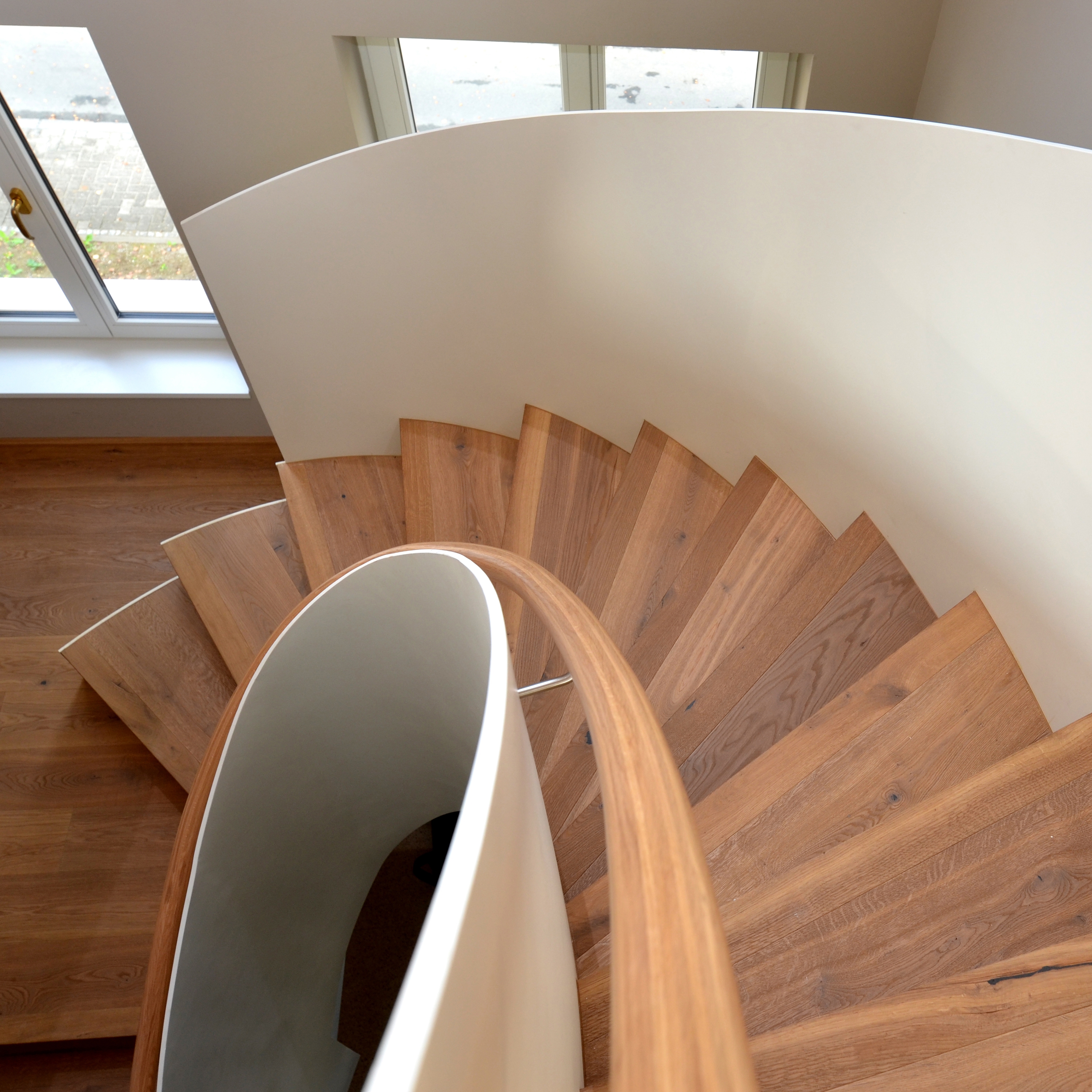 Produkt Moderne Faltwerktreppe in einem Wiesbadener Wohnhaus des Herstellers MetallArt Treppen anzeigen