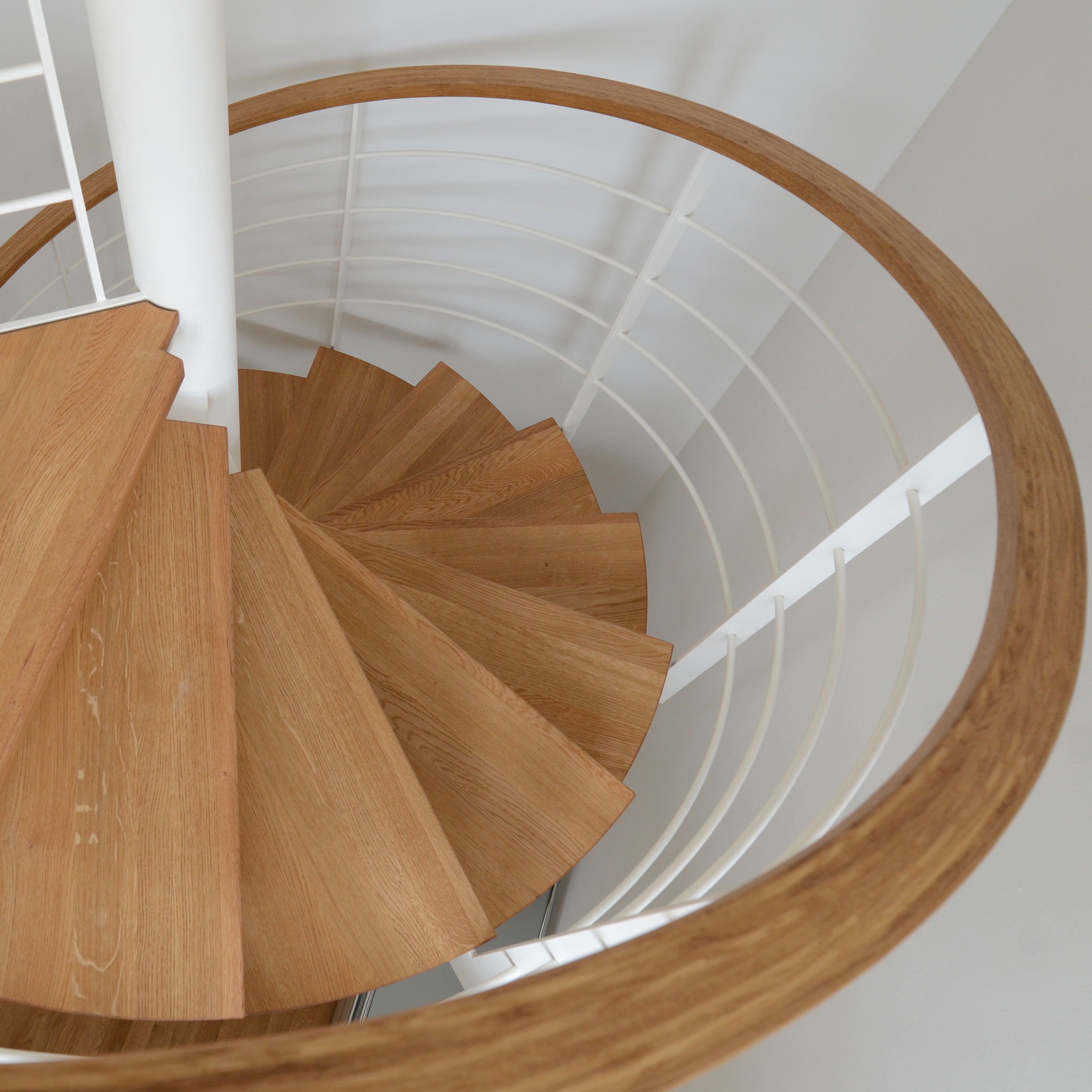 Produkt Filigrane Spindeltreppe in einem Stuttgarter Wohnhaus des Herstellers MetallArt Treppen anzeigen