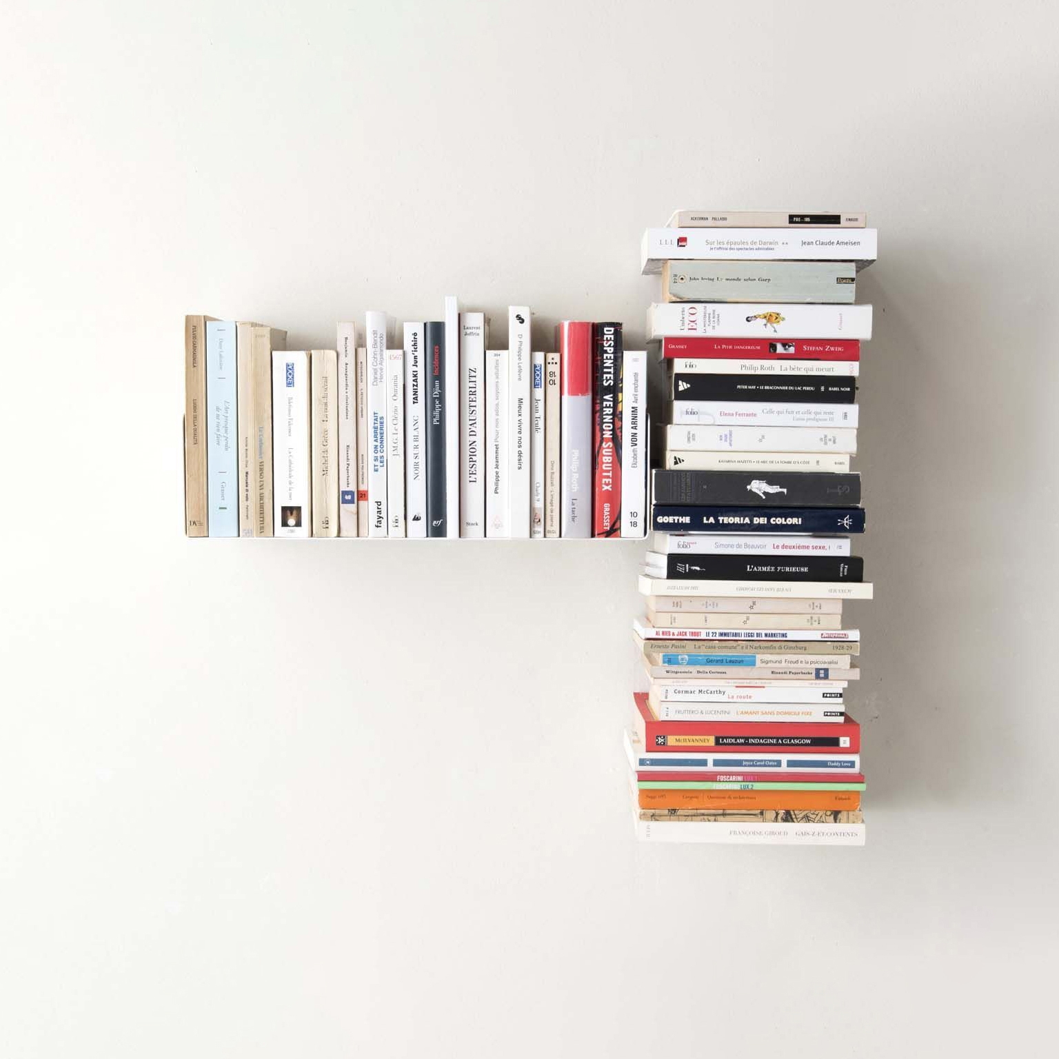 Display product T-left asymmetrical wall bookshelf from manufacturer Teebooks