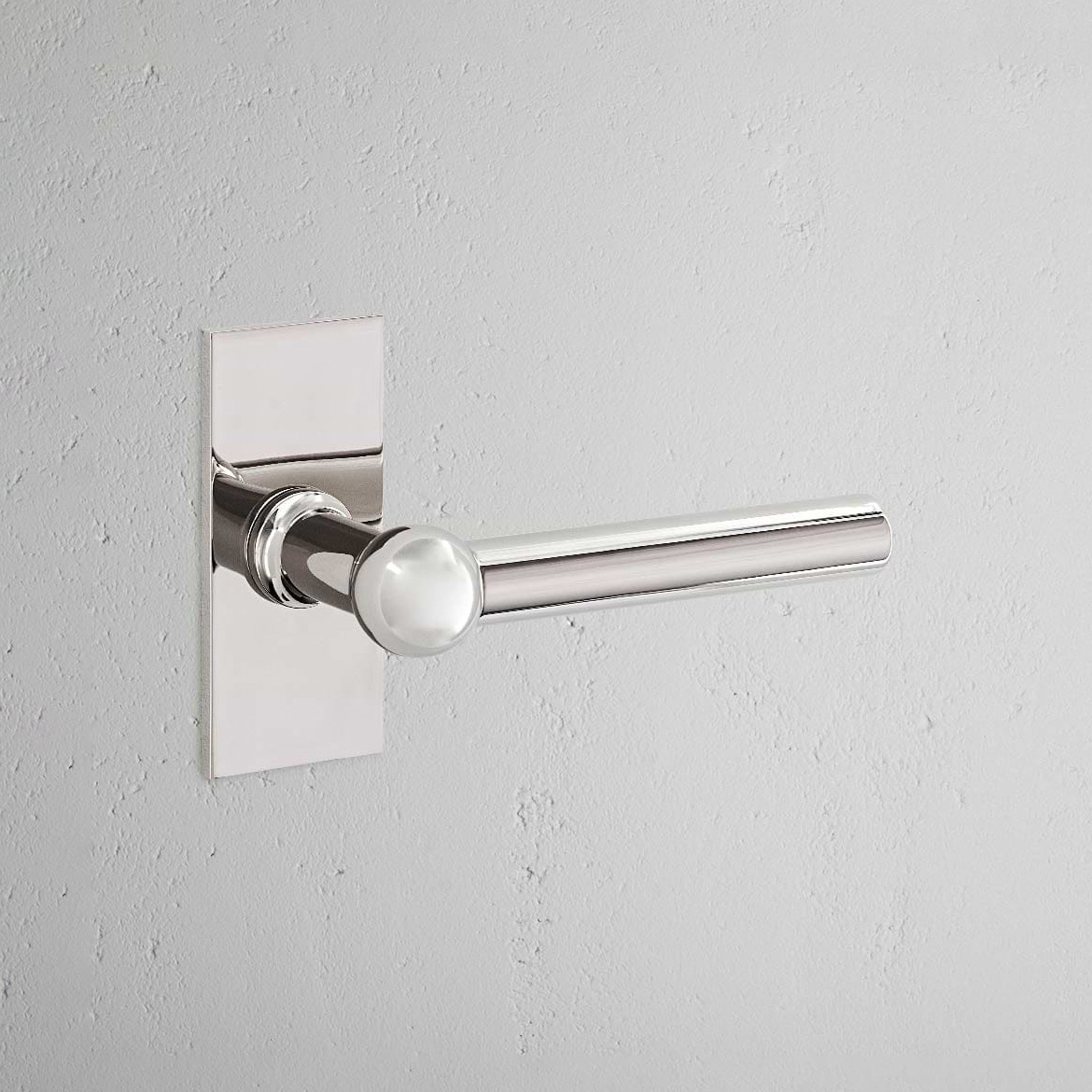 Manilla para puertas Harper con placa corta (con muelle)