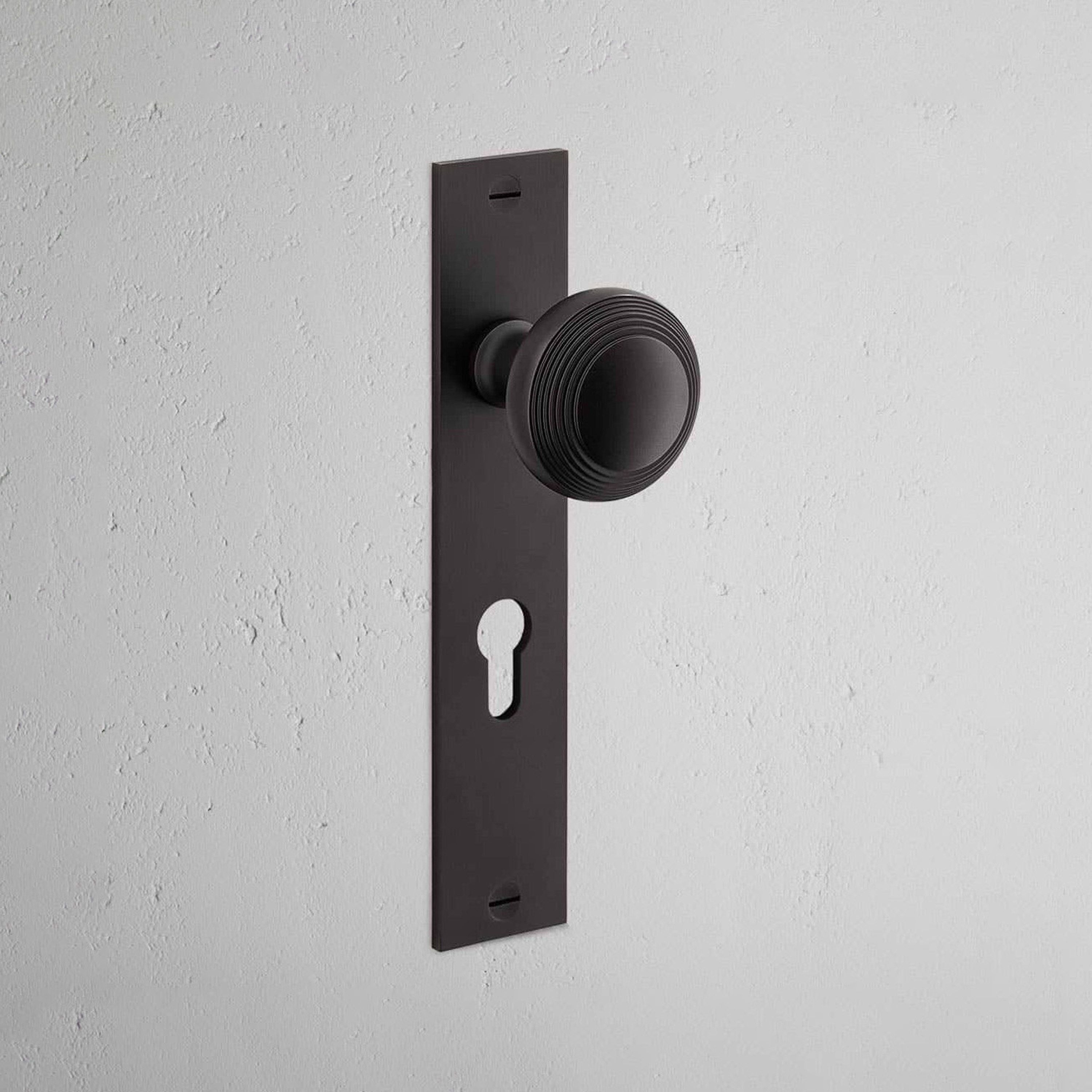Display product Poplar Long Plate Sprung Door Knob from manufacturer Corston Architectural Detail