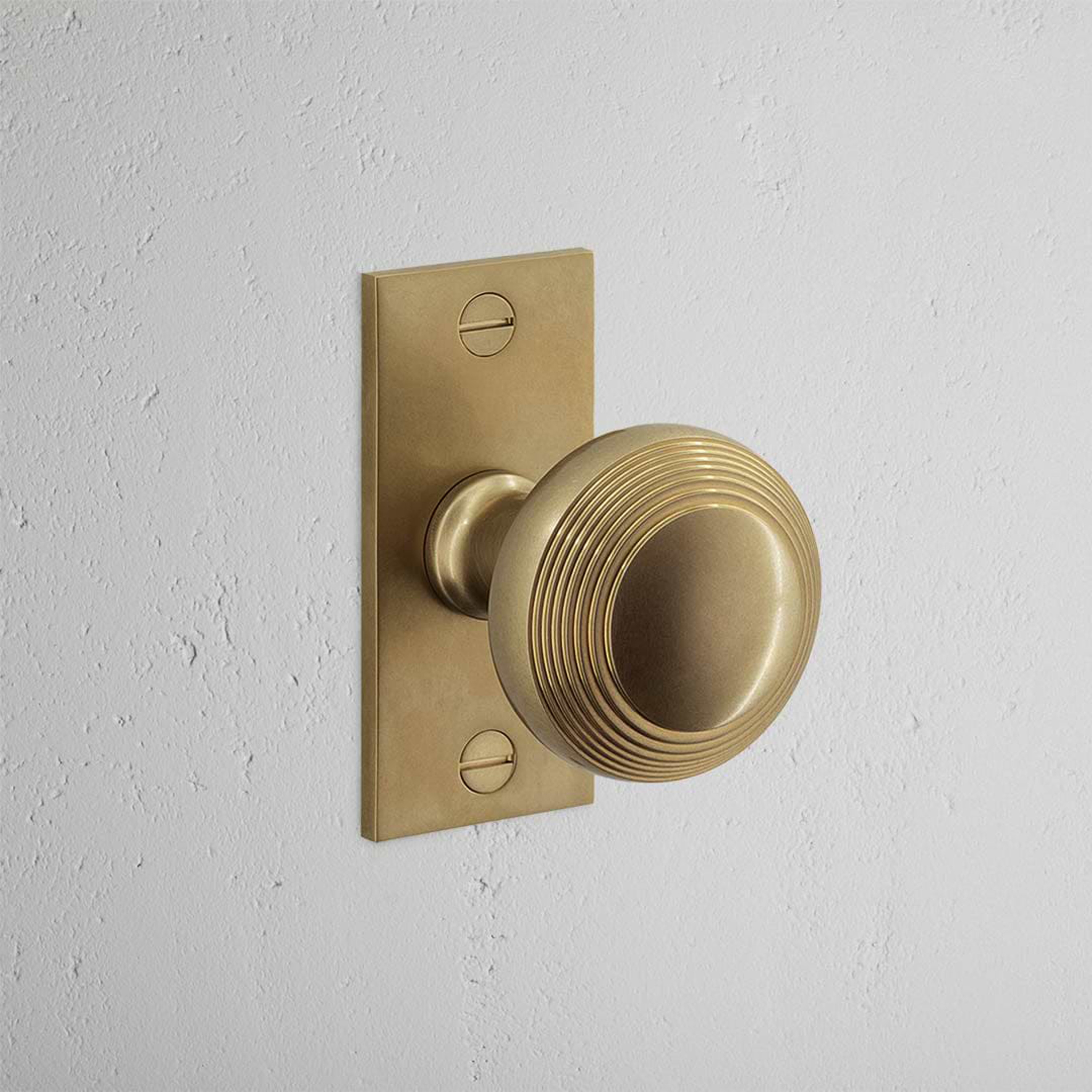 Display product Poplar Short Plate Sprung Door Knob from manufacturer Corston Architectural Detail