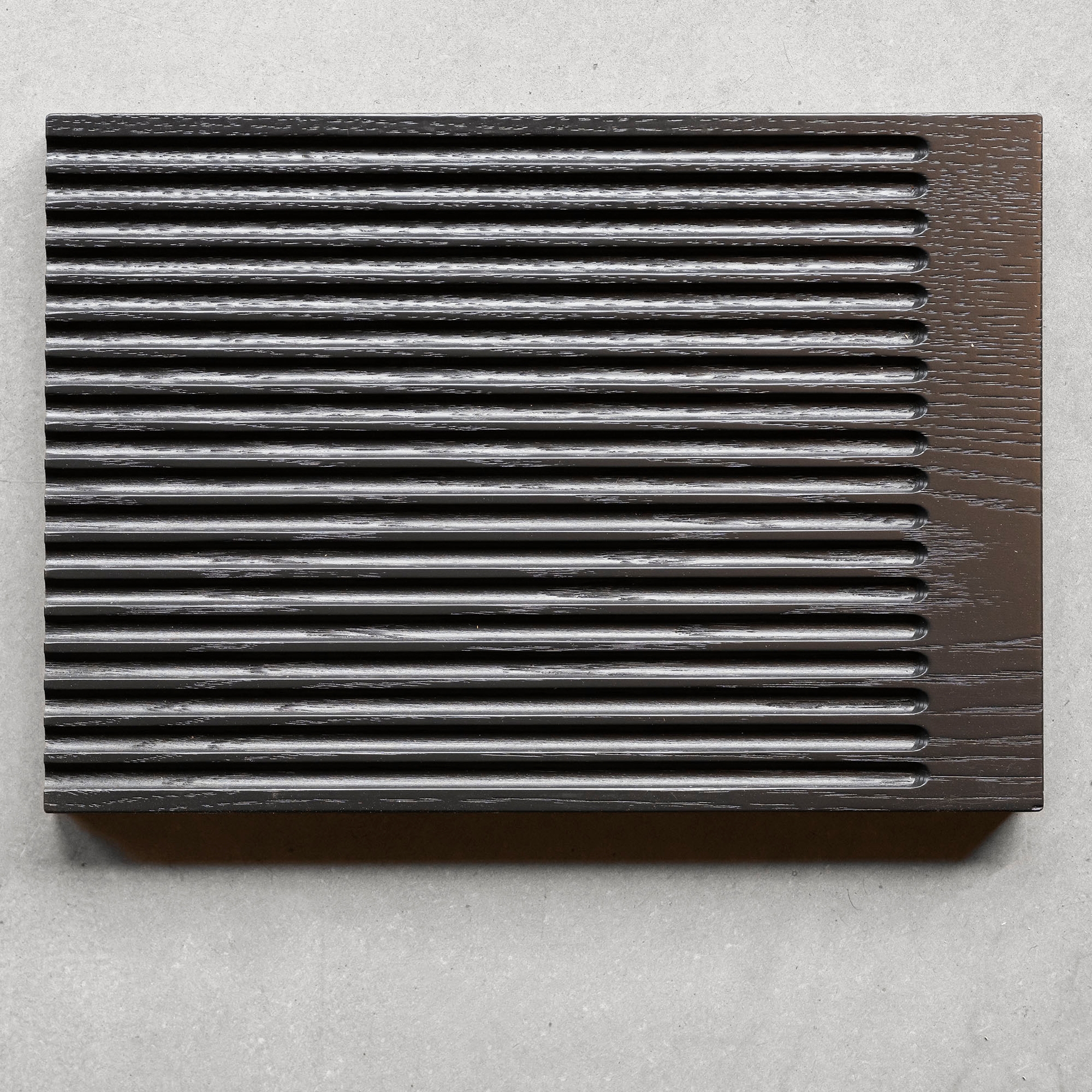 Display product Black-Stained Wood Panel with Finely Rounded Slot Milling from manufacturer barth 