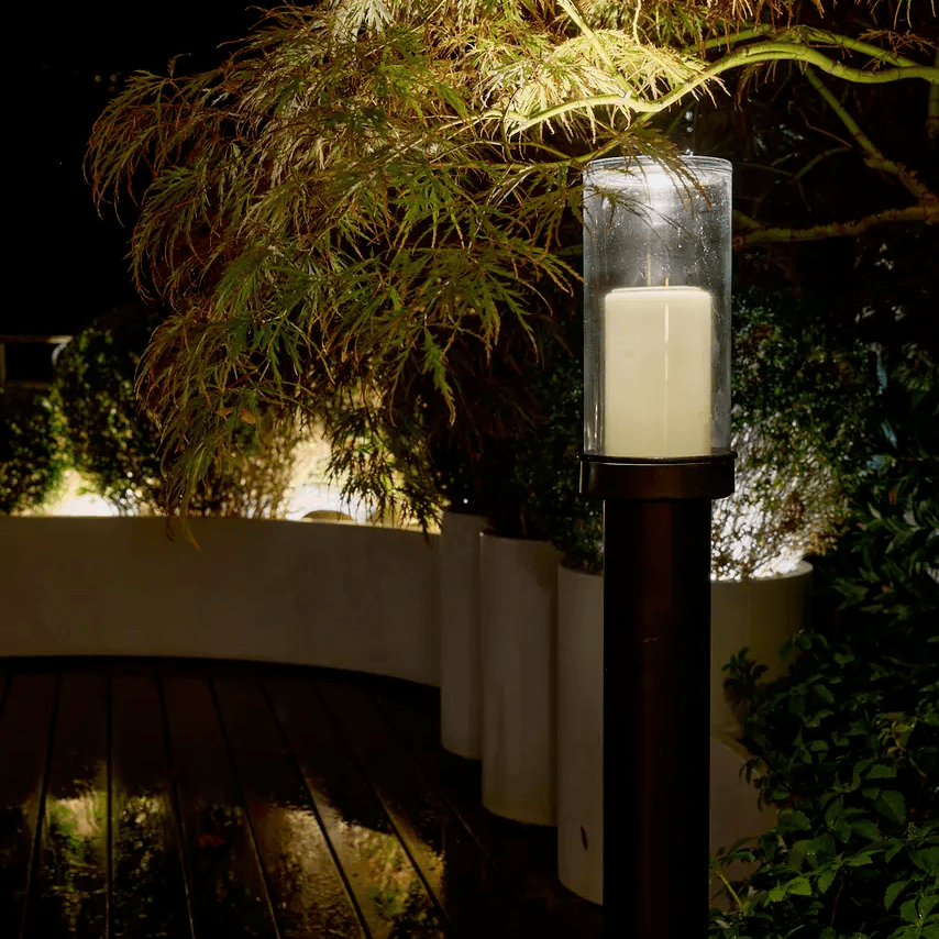 Display product Exterior electric standing candle unit at night from manufacturer LVL - USA