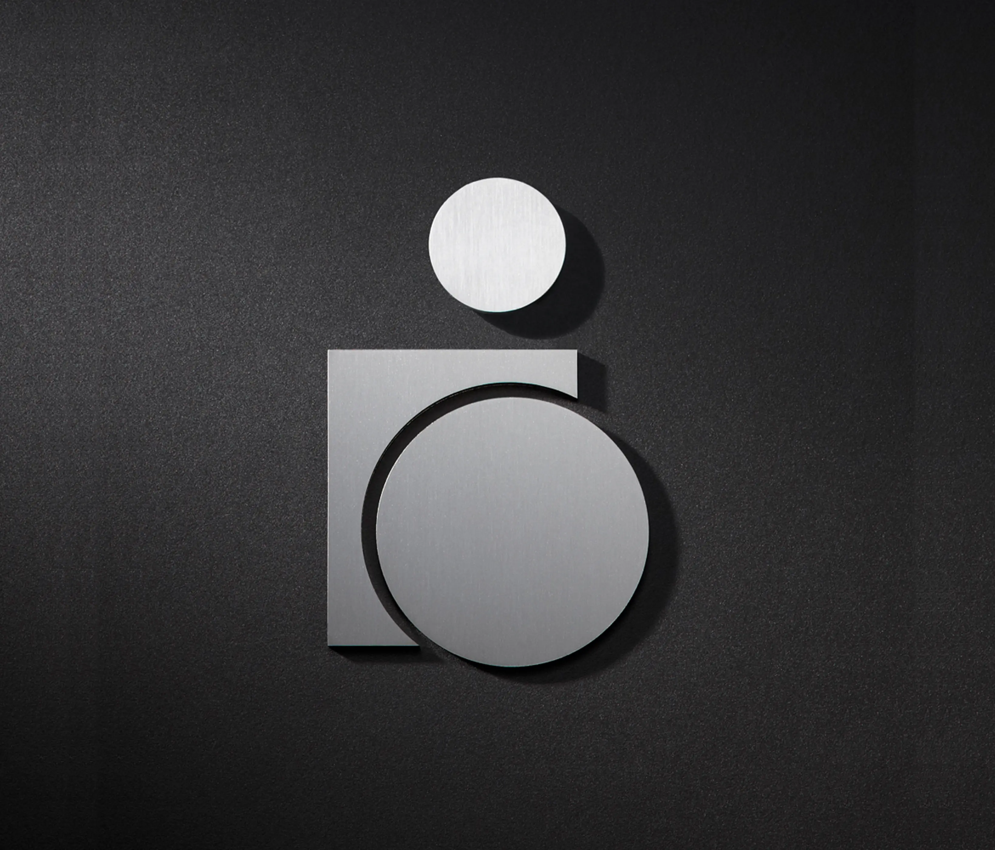 PHOS Design - Pittogramma WC utente in sedia a rotelle, sinistra