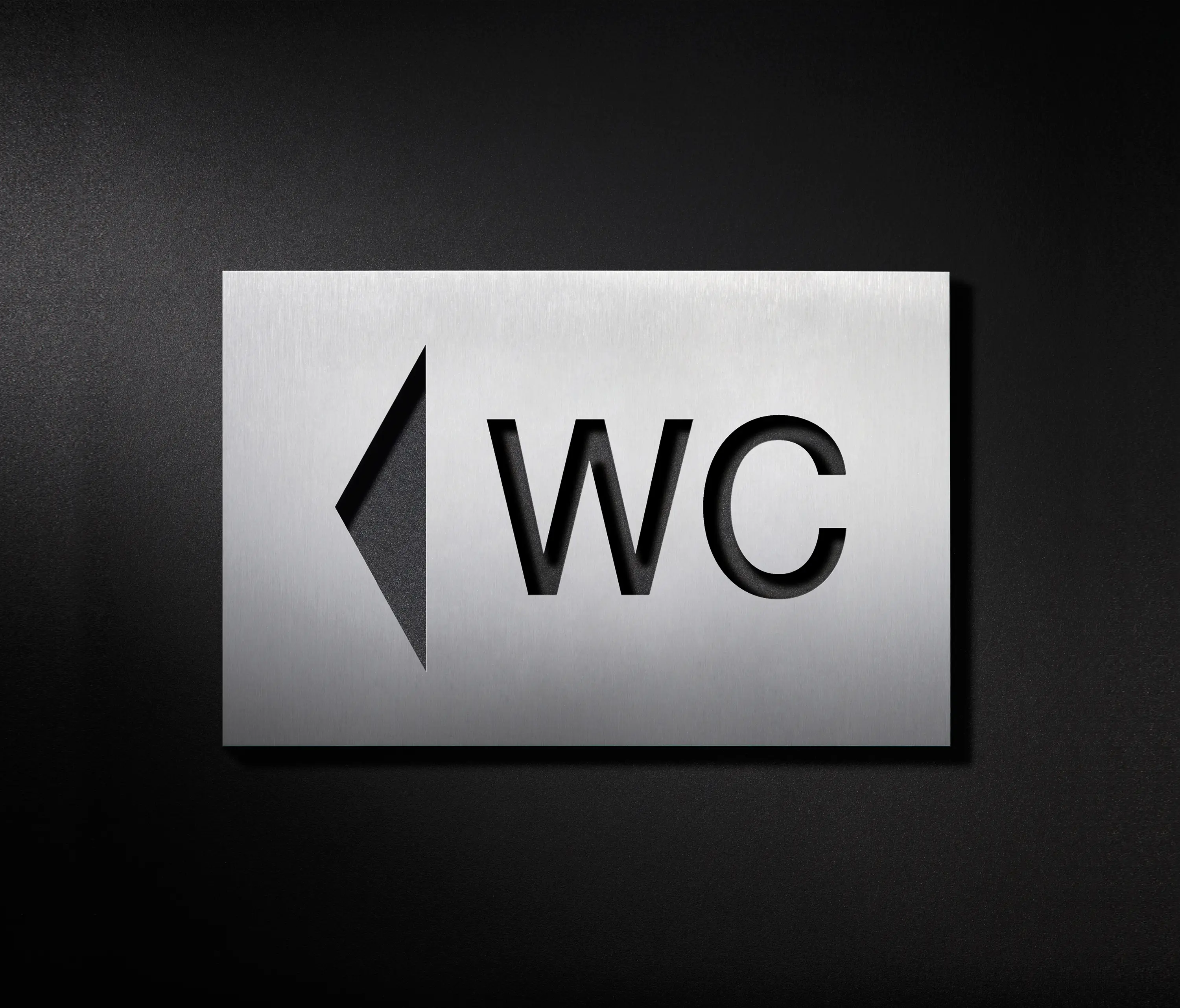 PHOS Design - Señal WC, flecha apuntando a la izquierda