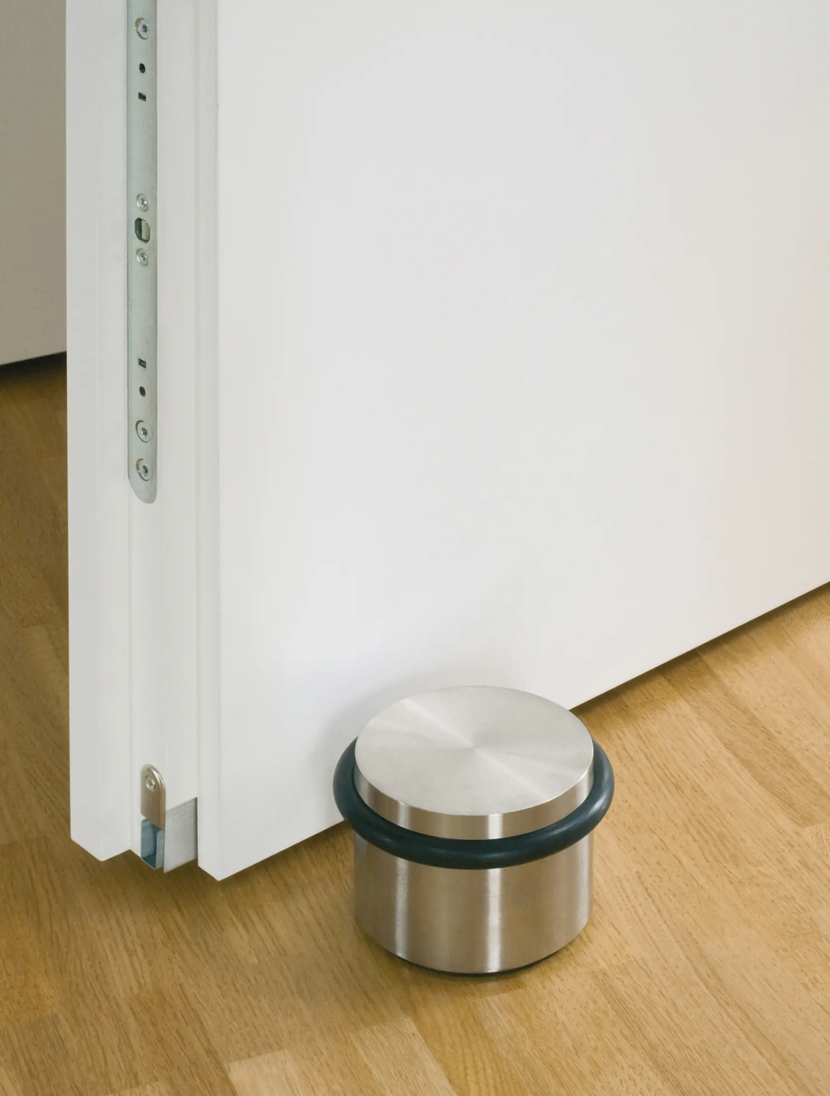 PHOS Design - High-quality and heavy floor door stopper without assembly
