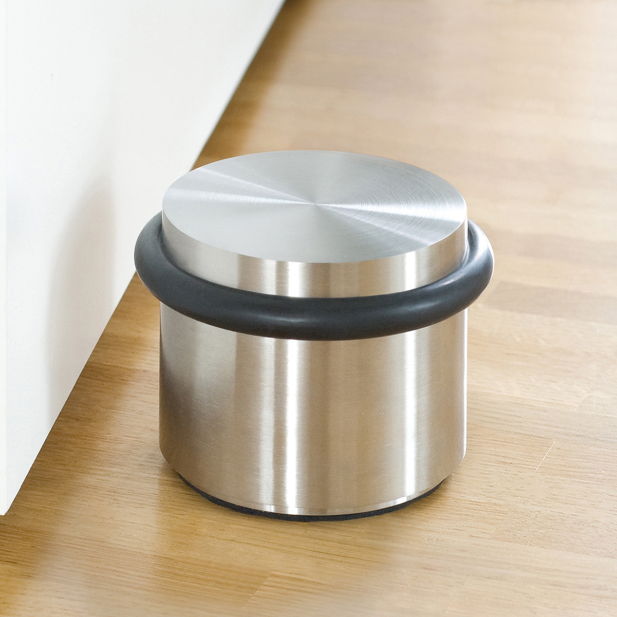 Mostra il prodotto Fermaporta a pavimento di alta qualità e pesantezza senza montaggio del produttore PHOS Design