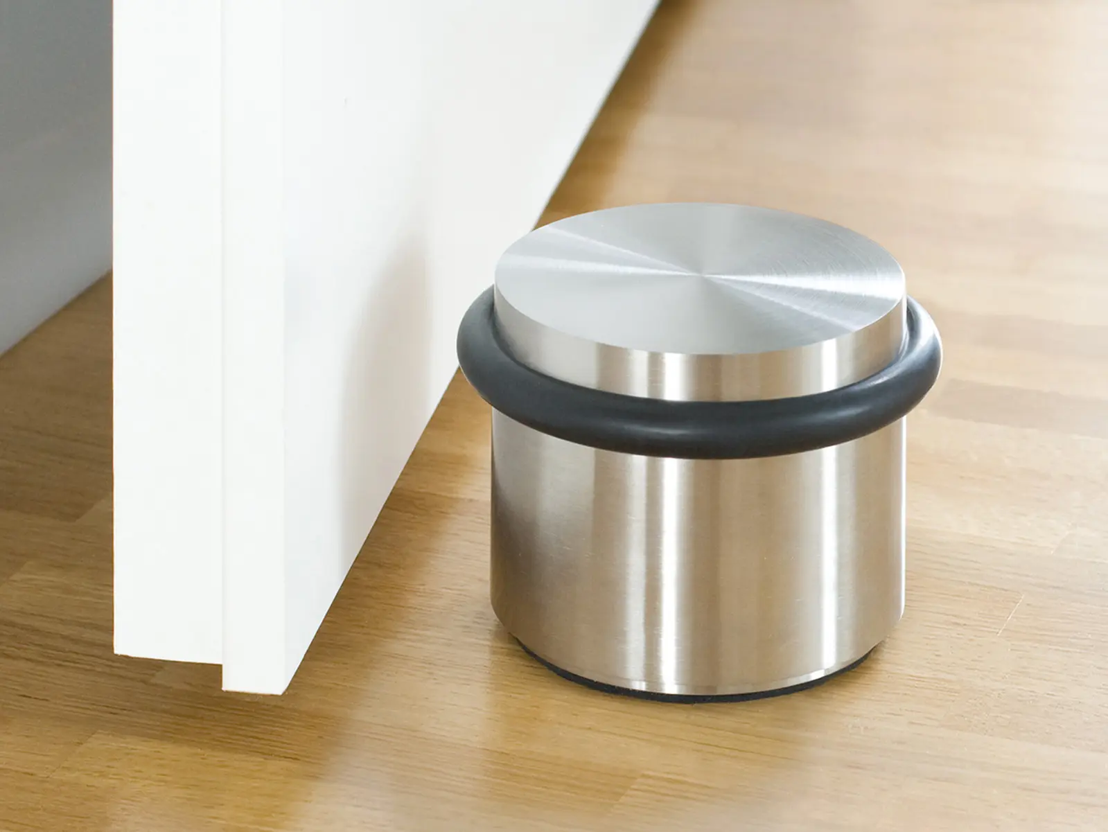 PHOS Design - High-quality and heavy floor door stopper without assembly