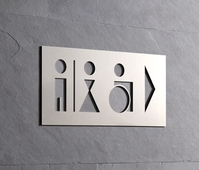 PHOS Design - Cartello WC per uomini e donne con utente in sedia a rotelle e freccia a destra
