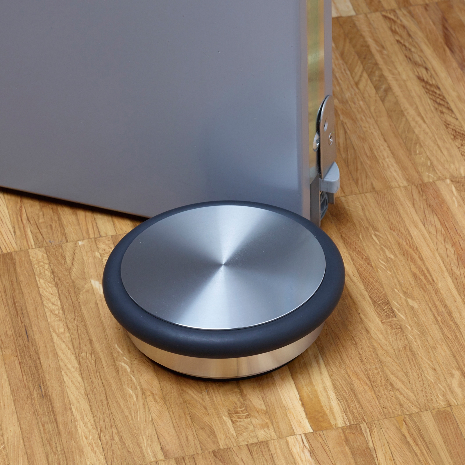 Display product Flat floor door stopper without screw connection from manufacturer PHOS Design