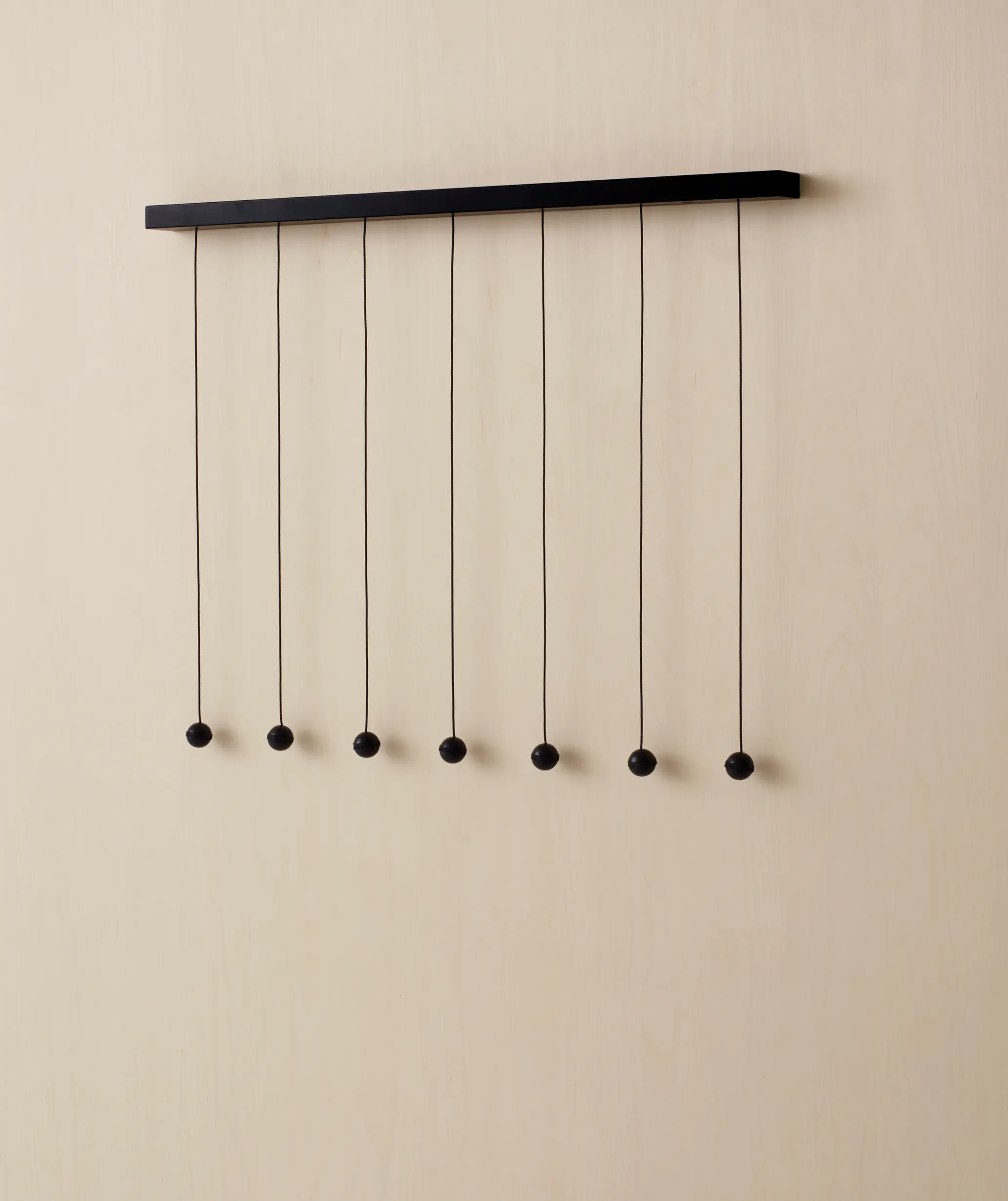 Swedese - Riddle newspaper hanger