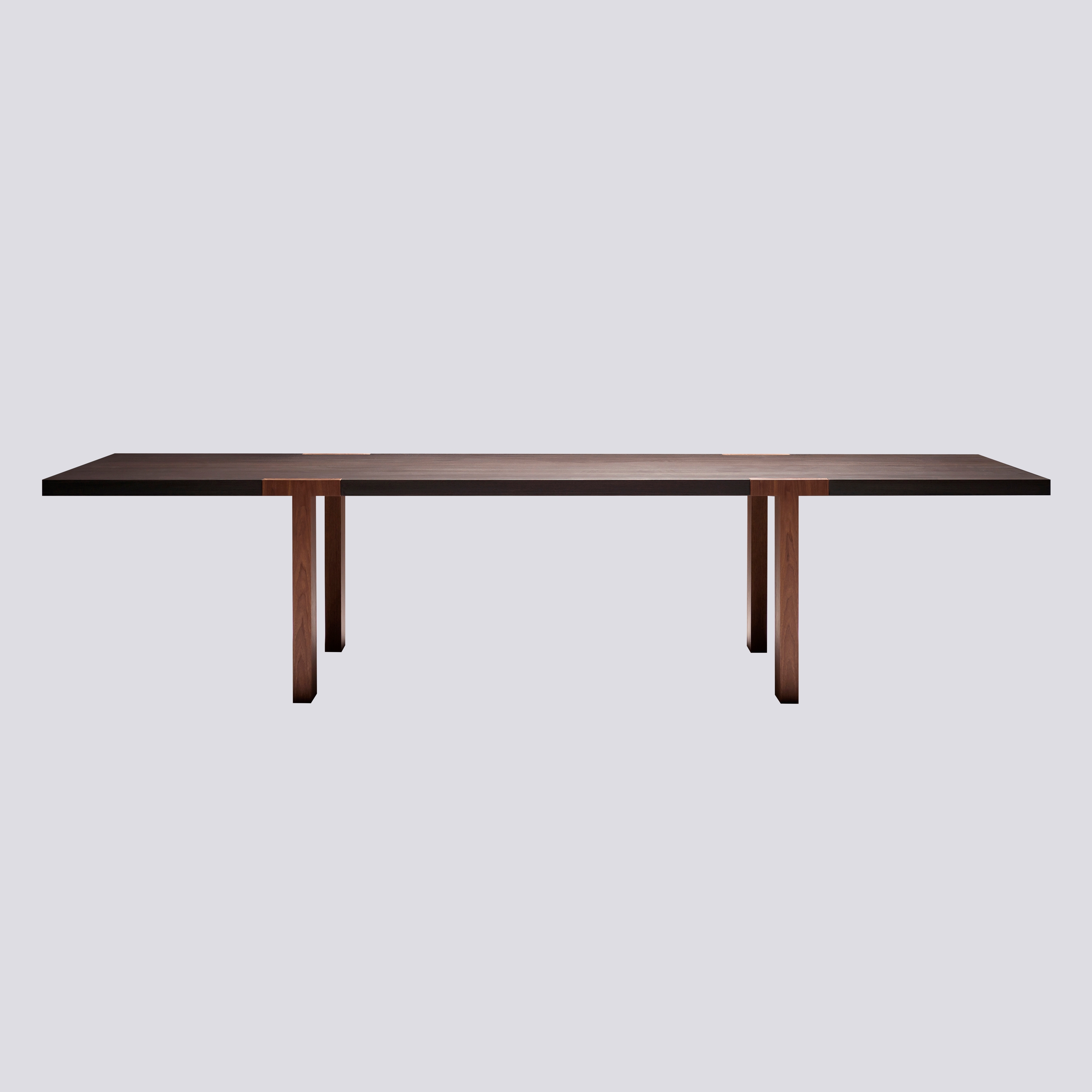 Display product T–Table from manufacturer Tacchini Italia