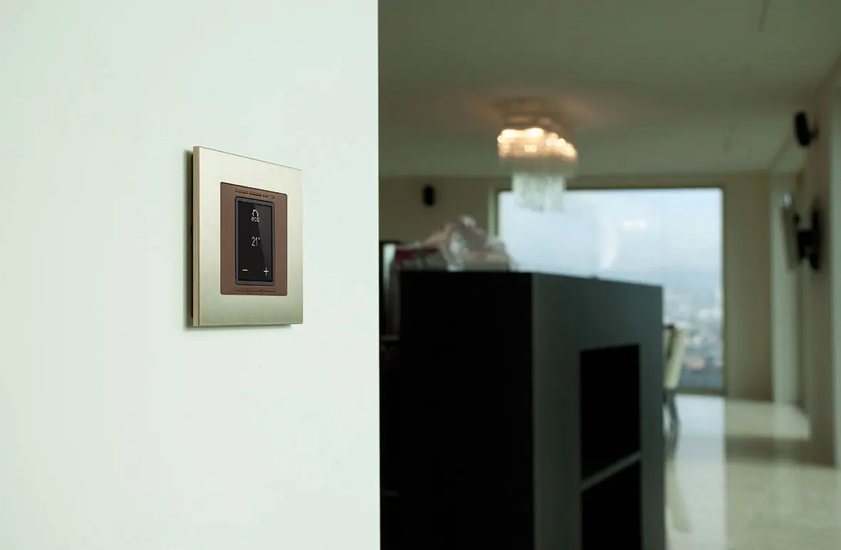 Feller - Thermostats | EDIZIO.liv Thermostat with heating/cooling switch