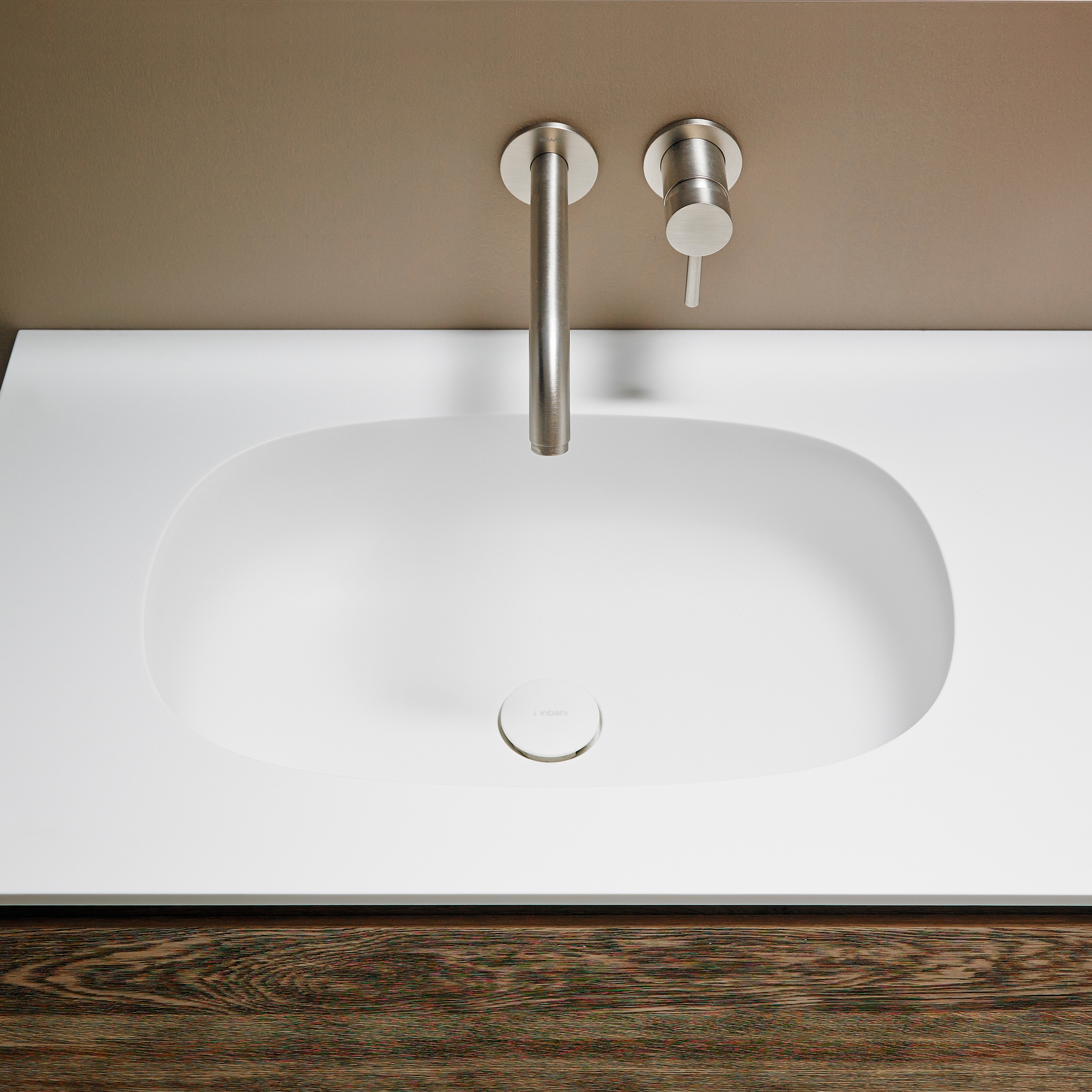 Display product Ovalo Corian® top with integrated washbasin from manufacturer Inbani