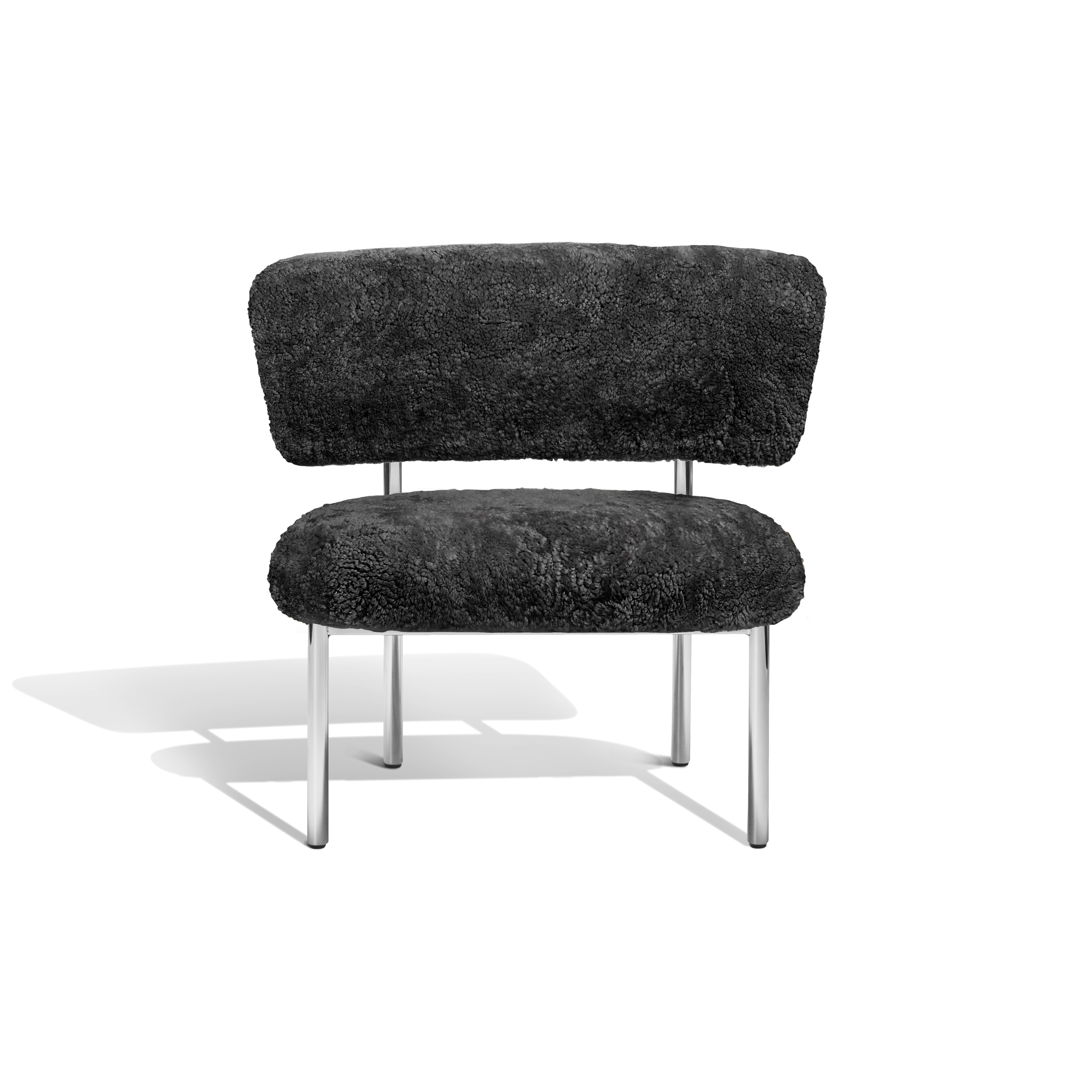 Font bold lounge chair | grey sheepskin