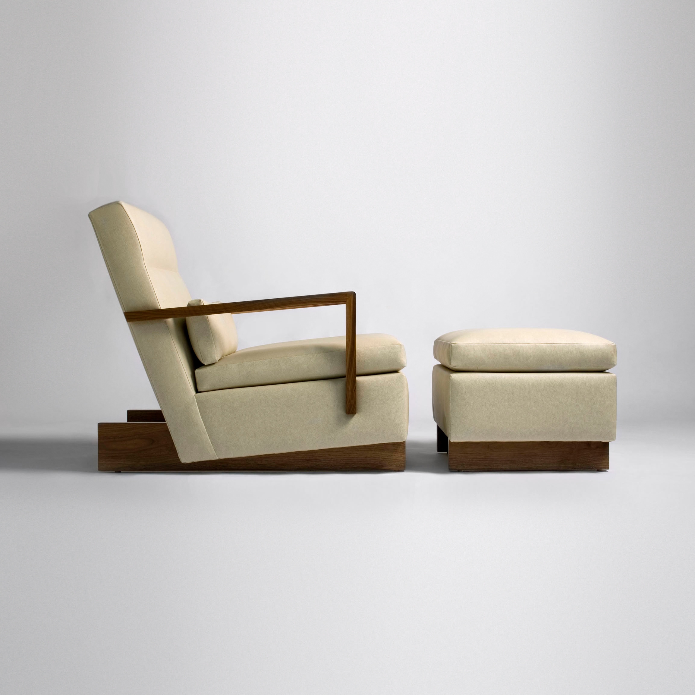 Display product Trax Chair with Arms & Ottoman from manufacturer Phase Design