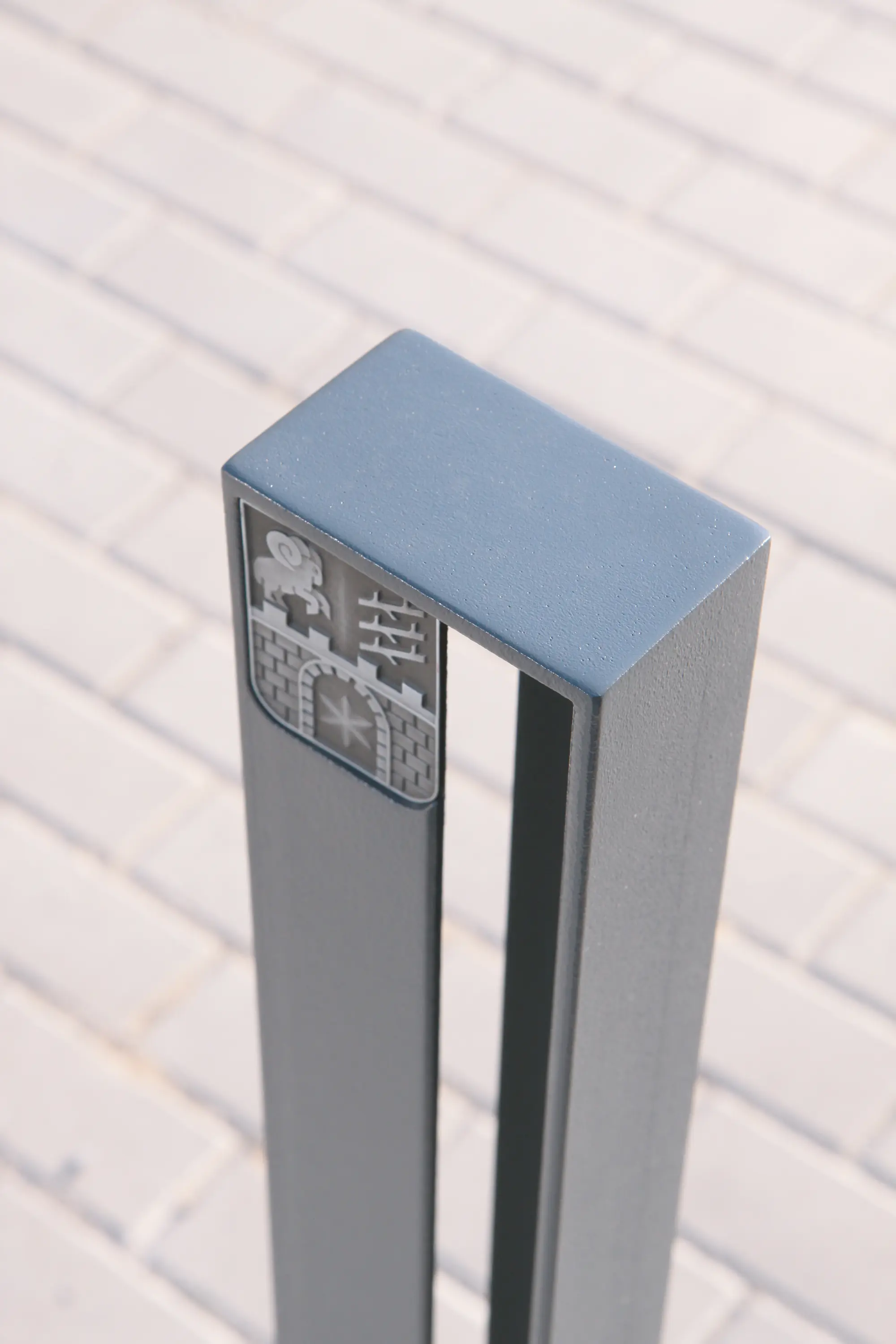 mmcité - elias | Bollard with municipal emblem
