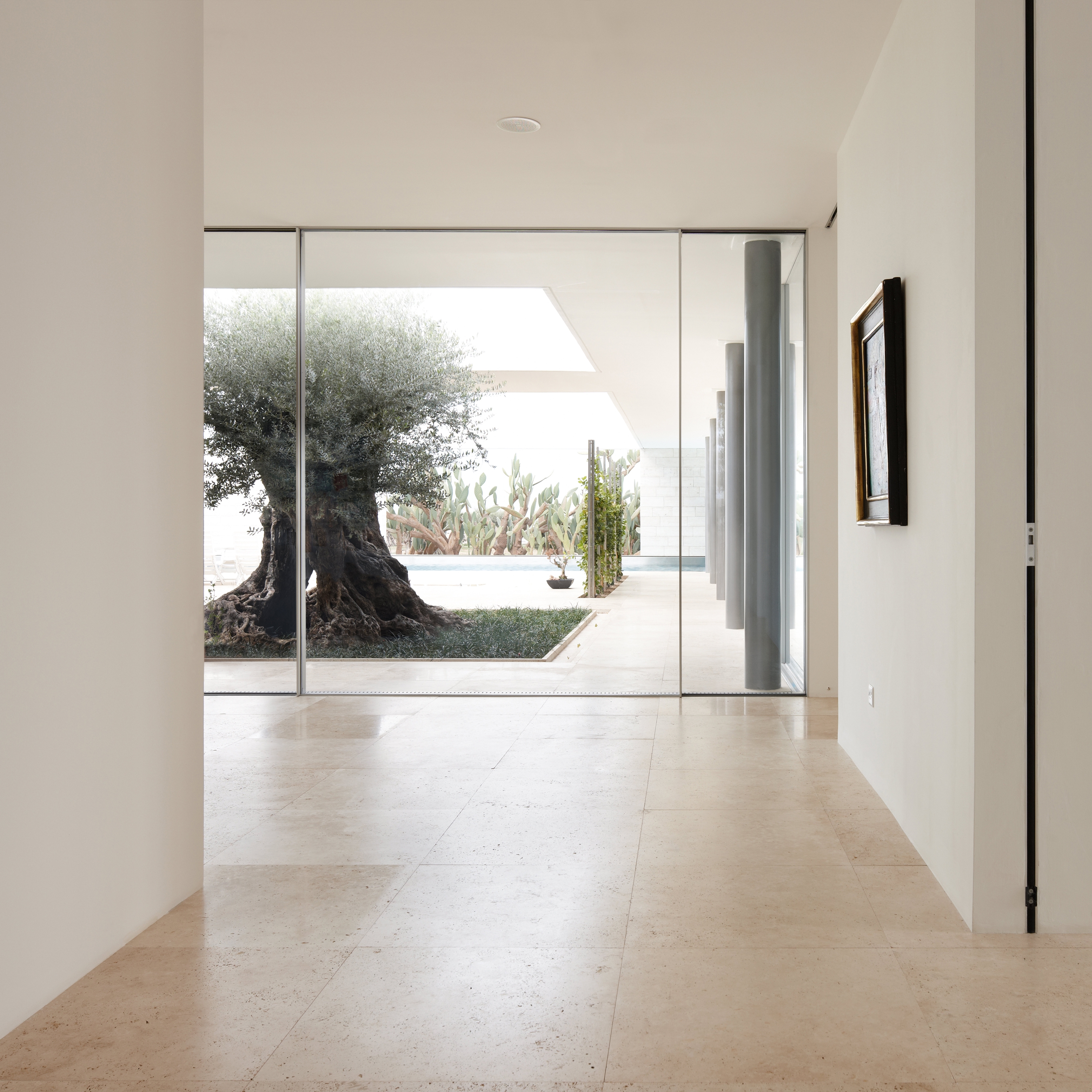 Frameless sliding windows with bullet resistance