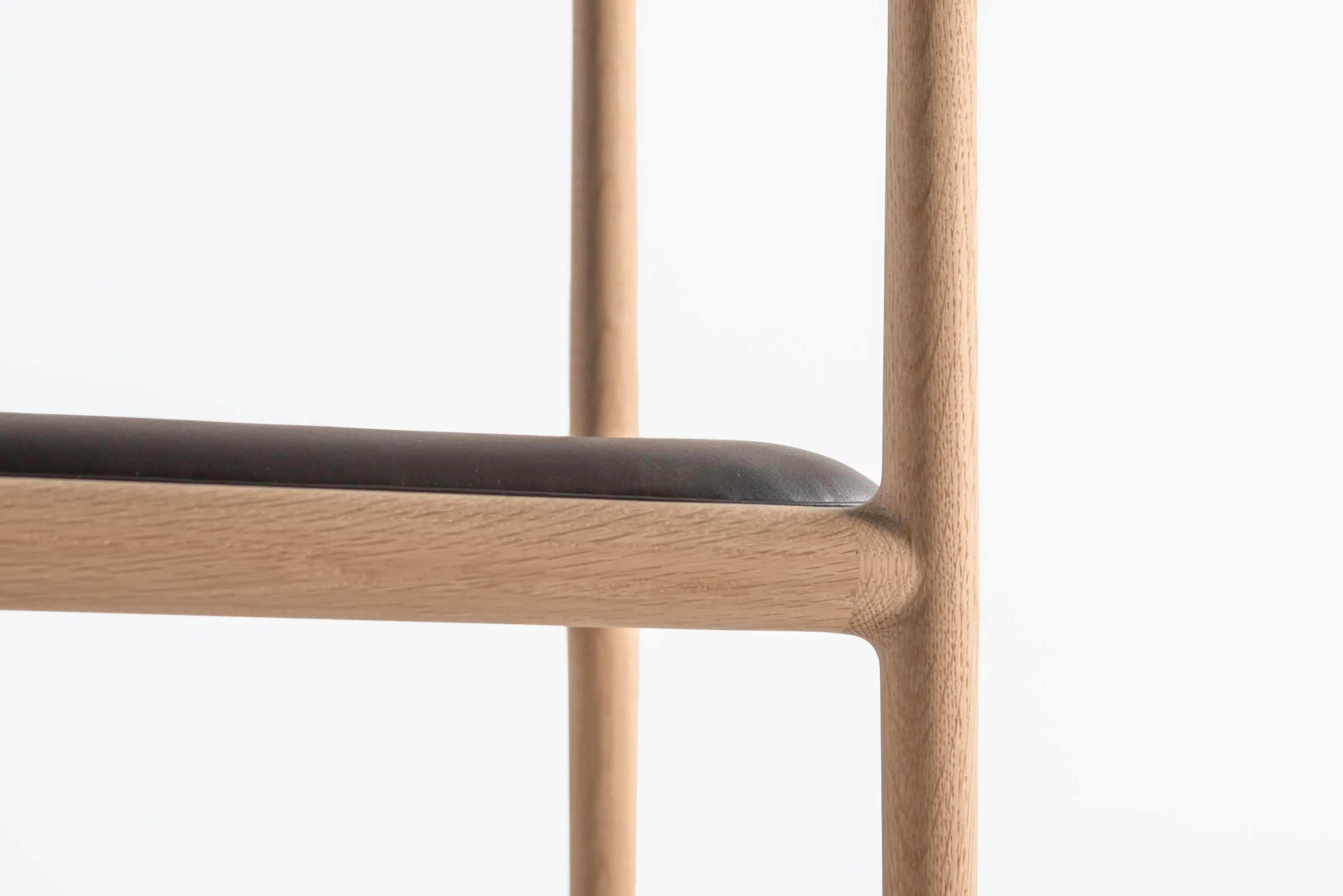 Time & Style - A chair on the vertical axis