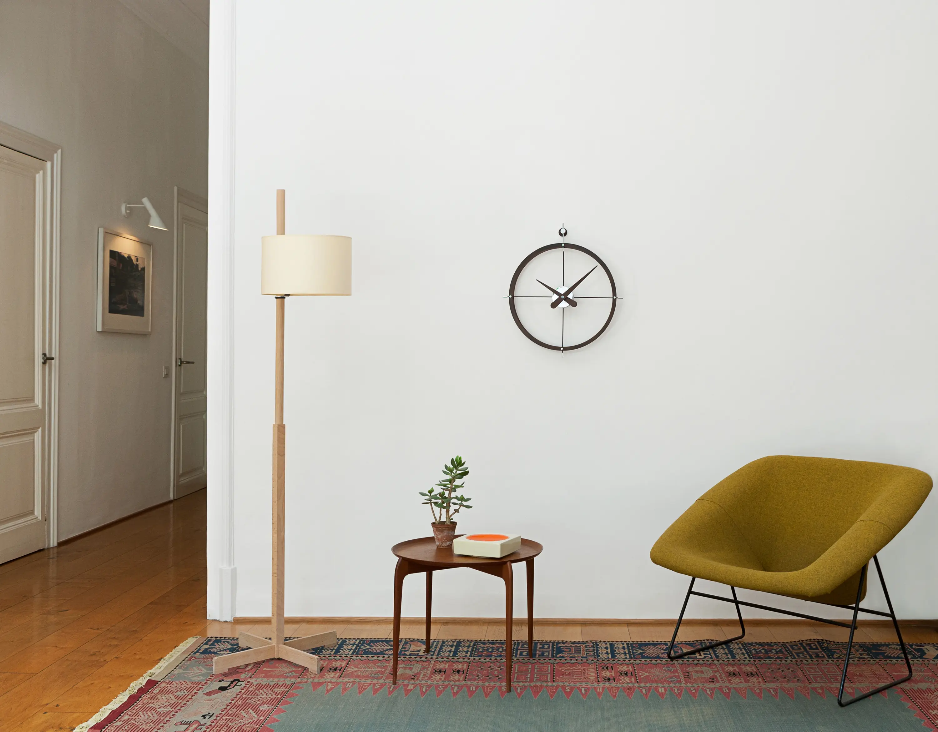 Nomon - Dos Puntos Wall Clock