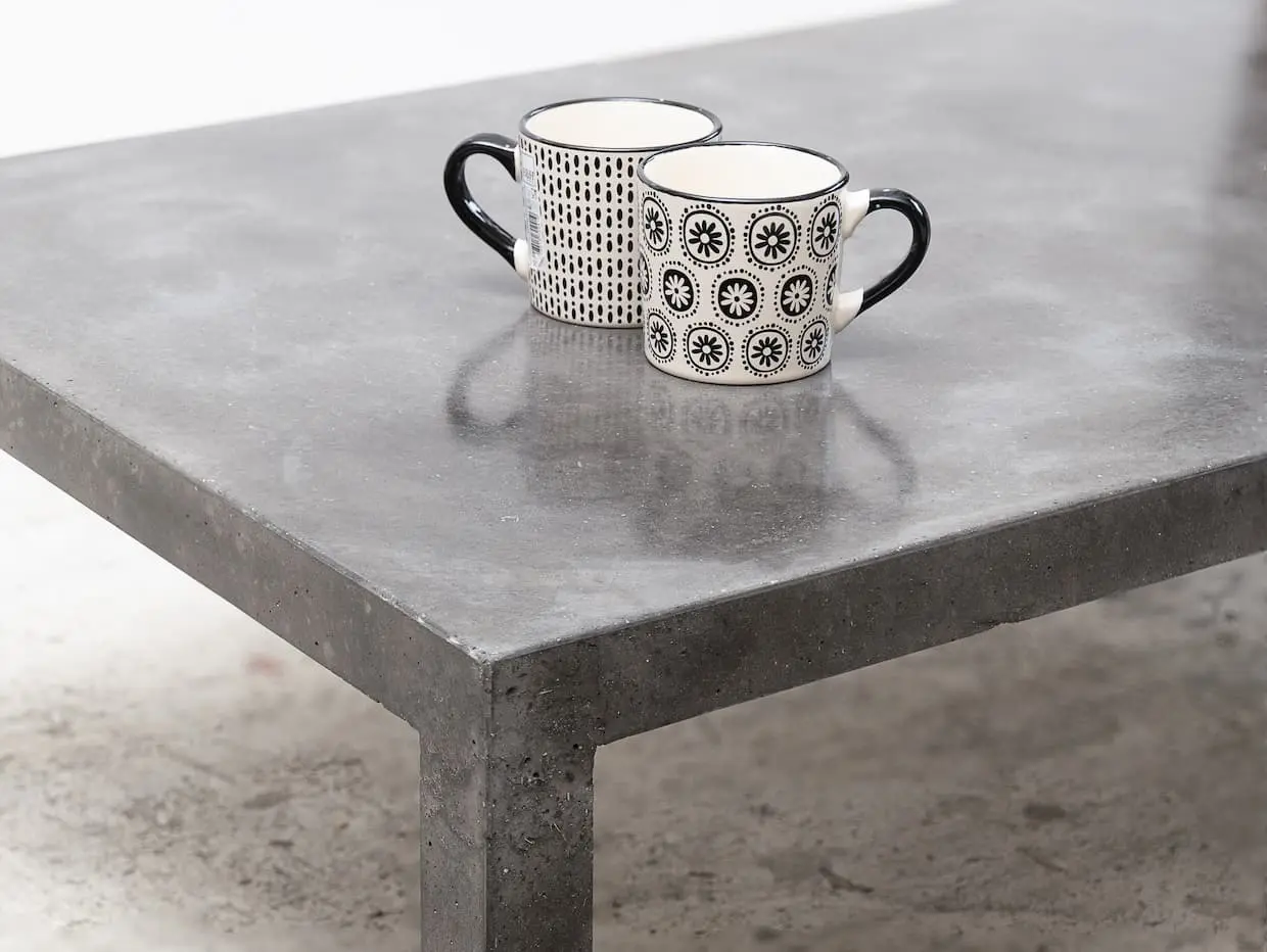 Dade Design AG concrete works Beton - dade TRONCO concrete bar table