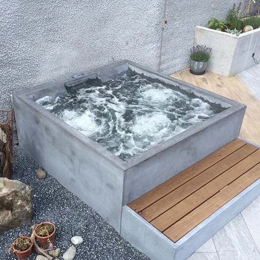 Display product dade HOTSTONE concrete whirlpool from manufacturer Dade Design AG concrete works Beton