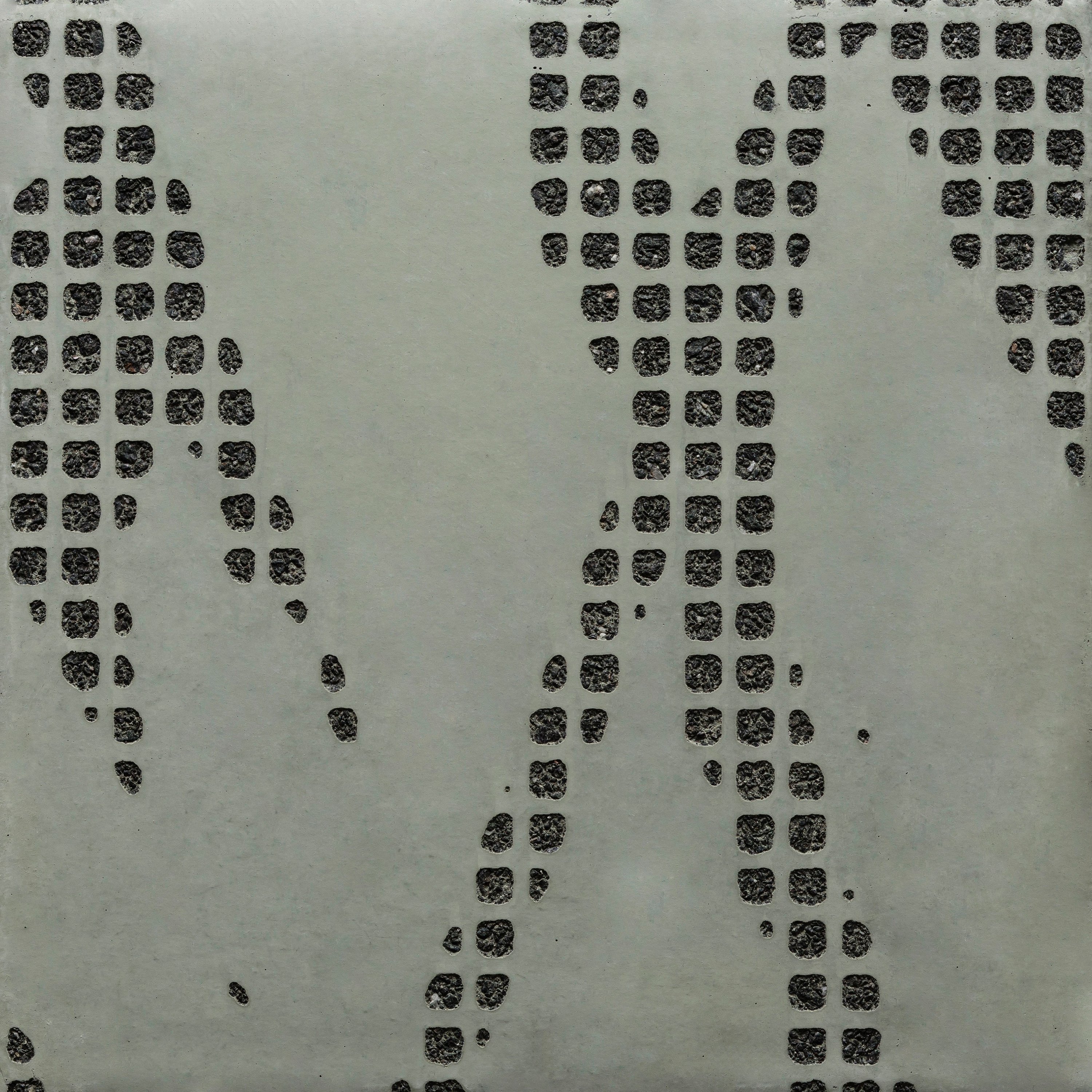 Display product GCFlow Grass green cement - black aggregate from manufacturer Graphic Concrete