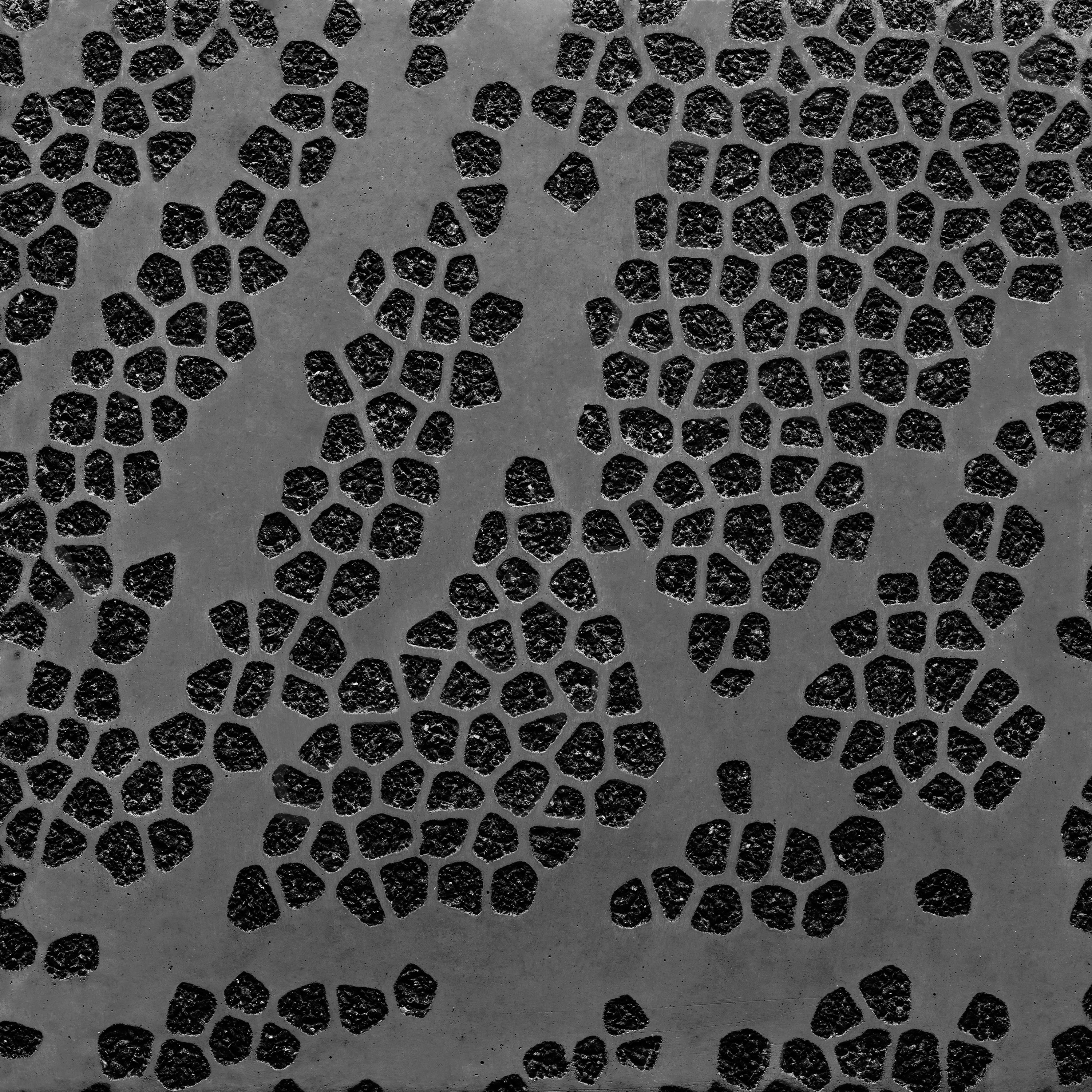 Display product GCFlow Mosaic Ellipse black cement - black aggregate from manufacturer Graphic Concrete