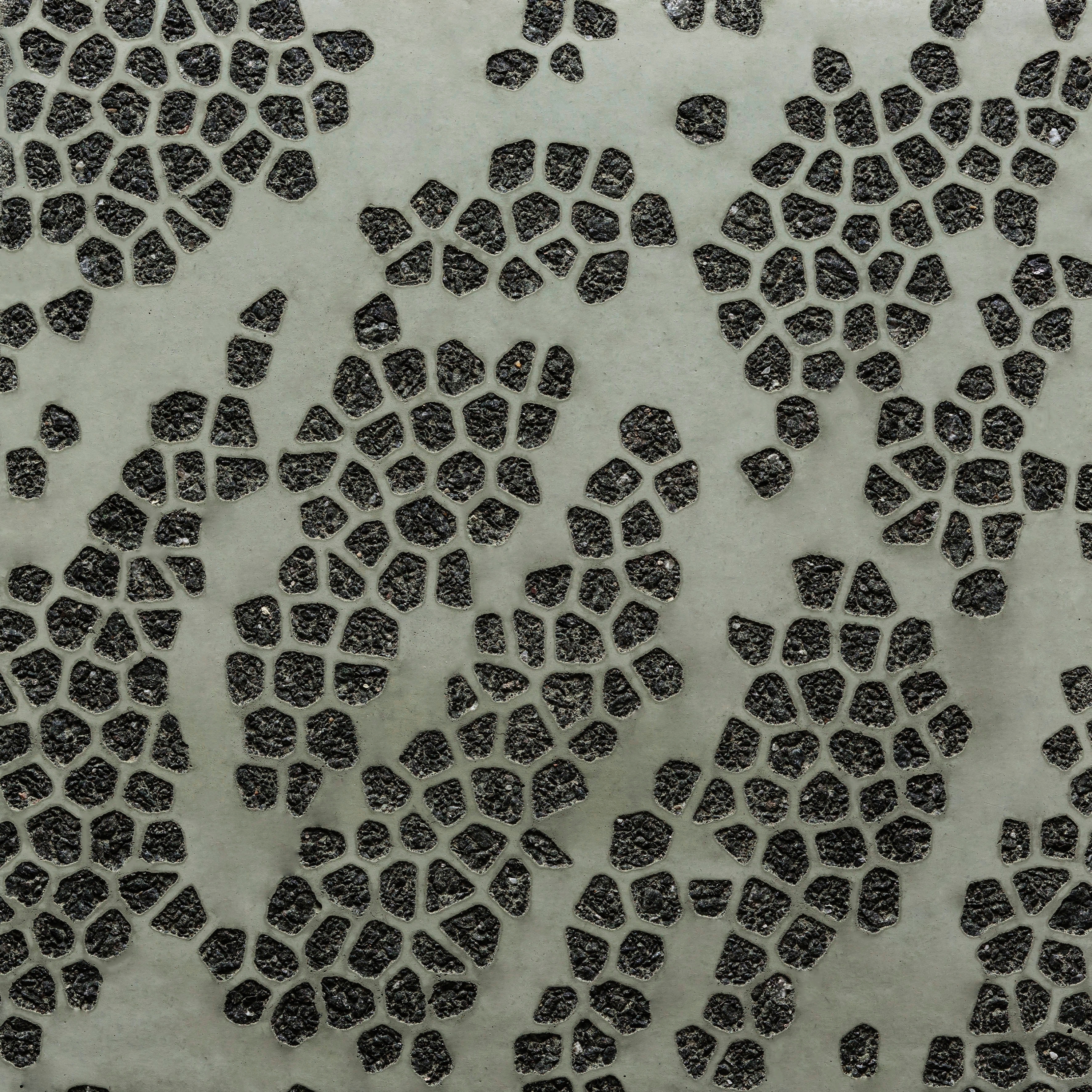 Display product GCFlow Mosaic Ellipse green cement - black aggregate from manufacturer Graphic Concrete