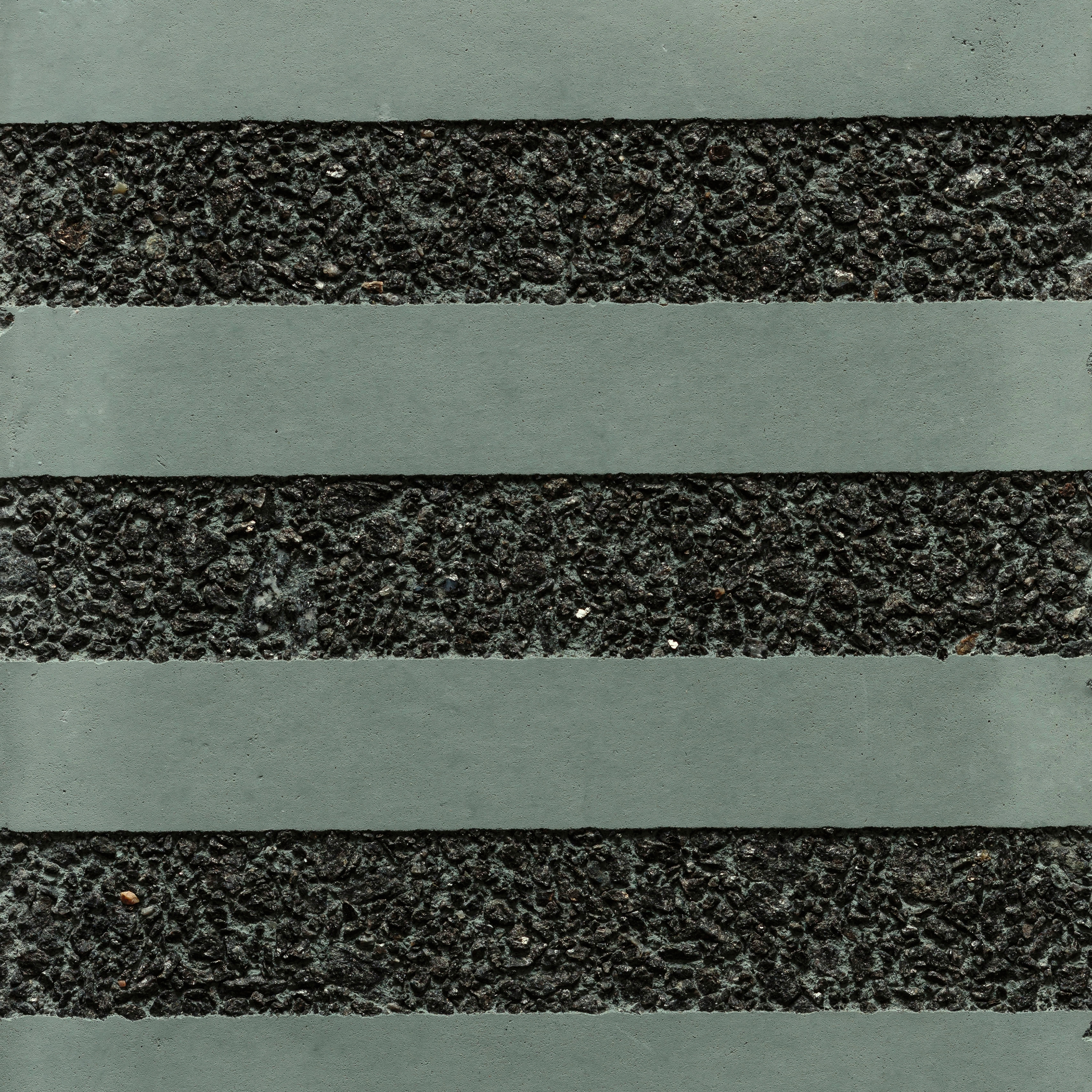 Display product GCGeo Stripes Horizontal green cement - black aggregate from manufacturer Graphic Concrete