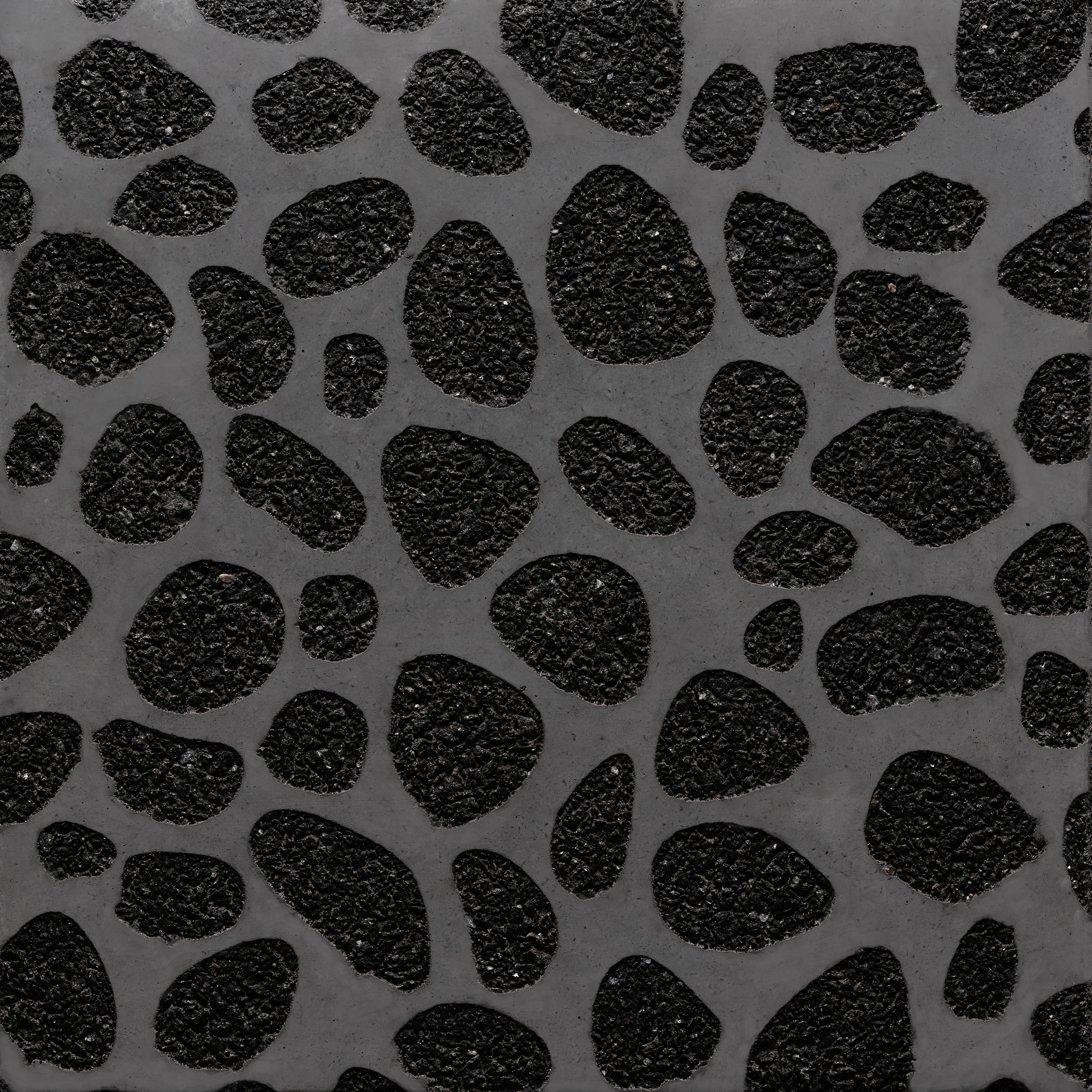 Afficher le produit GCNature Pebbles25 nega black cement - black aggregate du fabricant Graphic Concrete