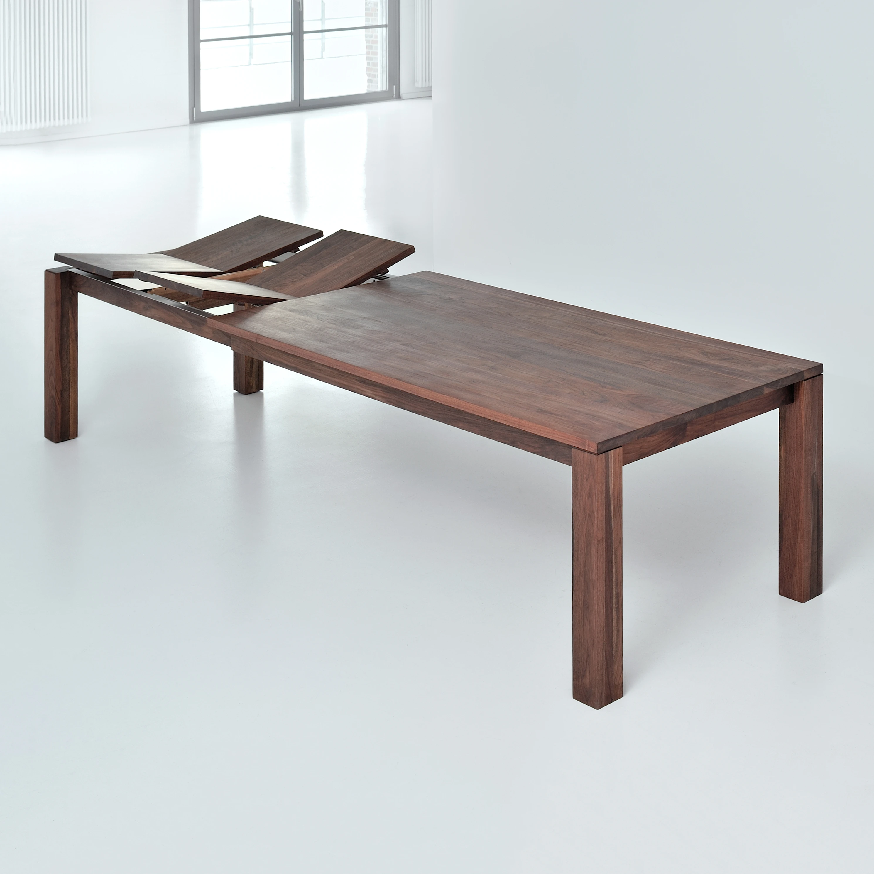 BUTTERFLY EXTENDING TABLES
