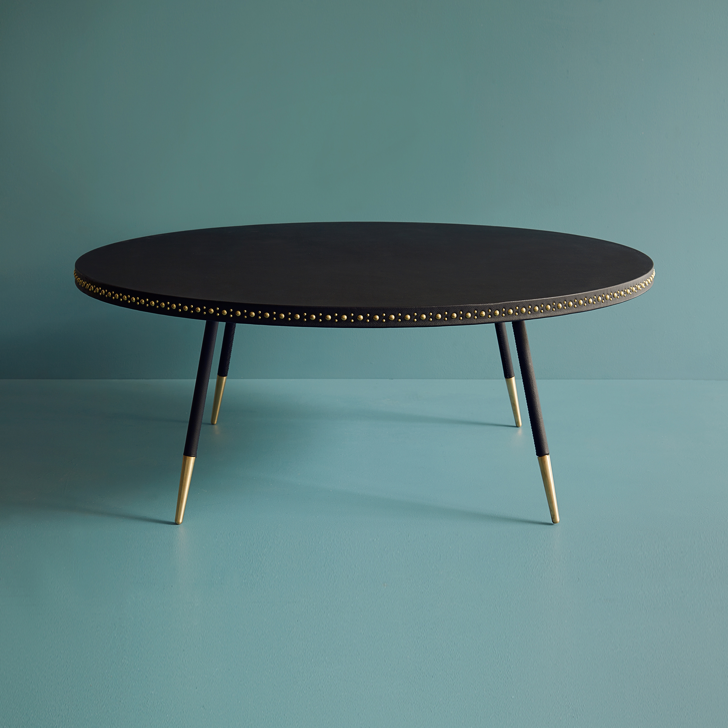 Stud leather coffee table