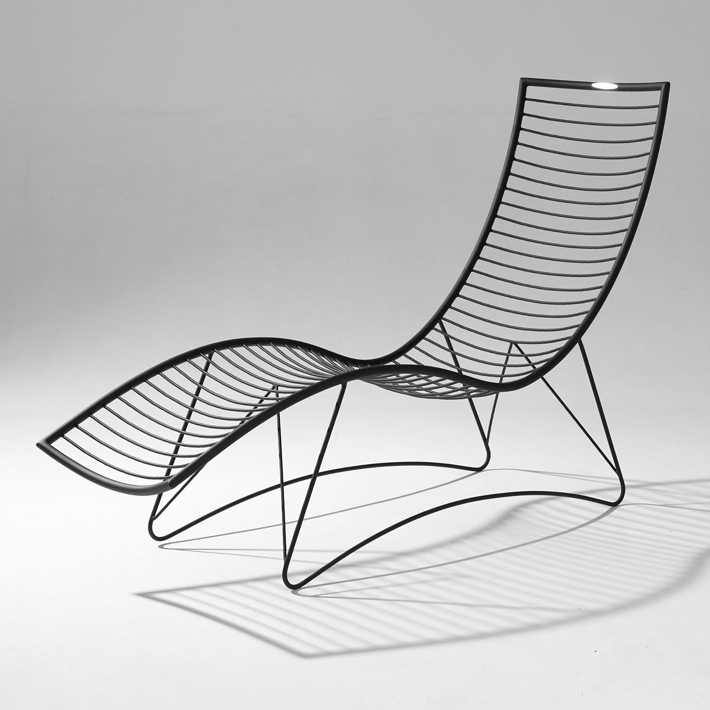 Display product Curve Wave Lounger Swing Chair on Base stand from manufacturer Studio Stirling