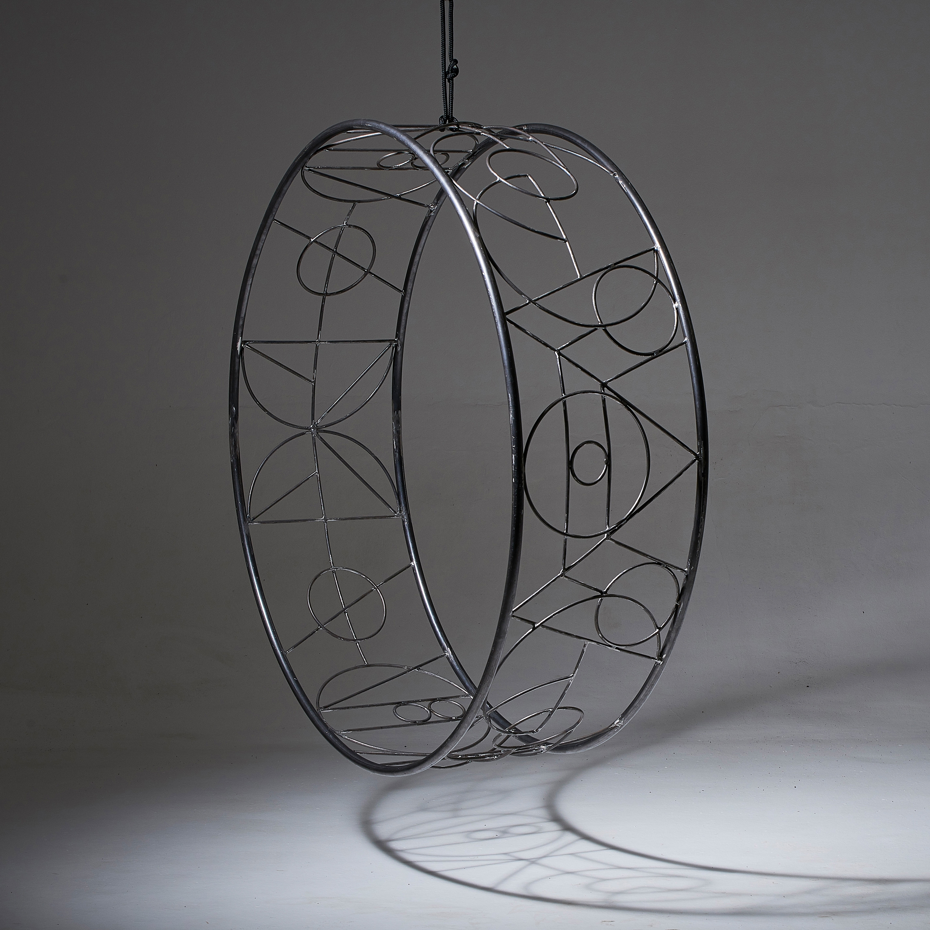 Display product Wheel Hanging Swing Chair - Ndebele from manufacturer Studio Stirling