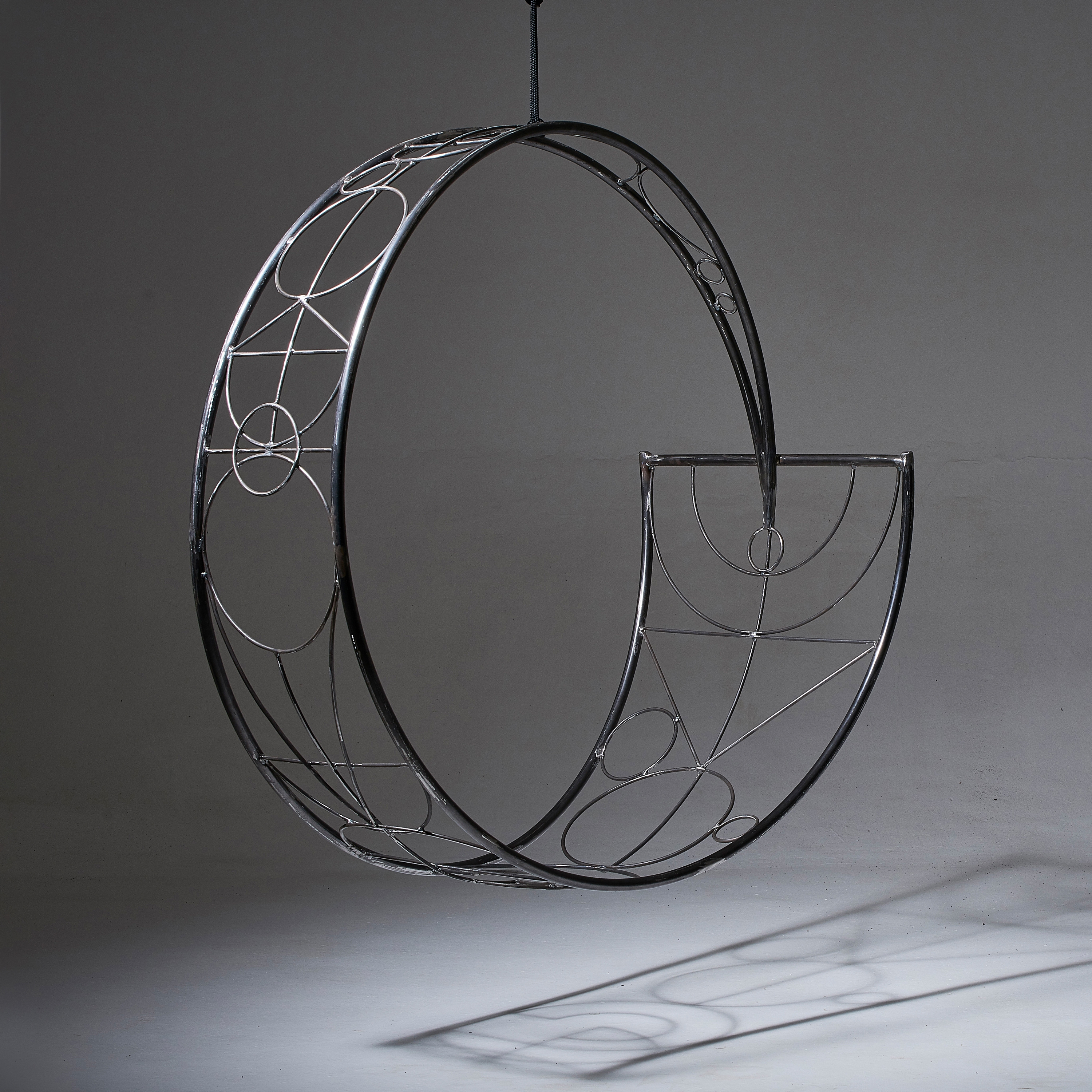 Display product Wheel Hanging Swing Chair - Ndebele Sharp Point from manufacturer Studio Stirling