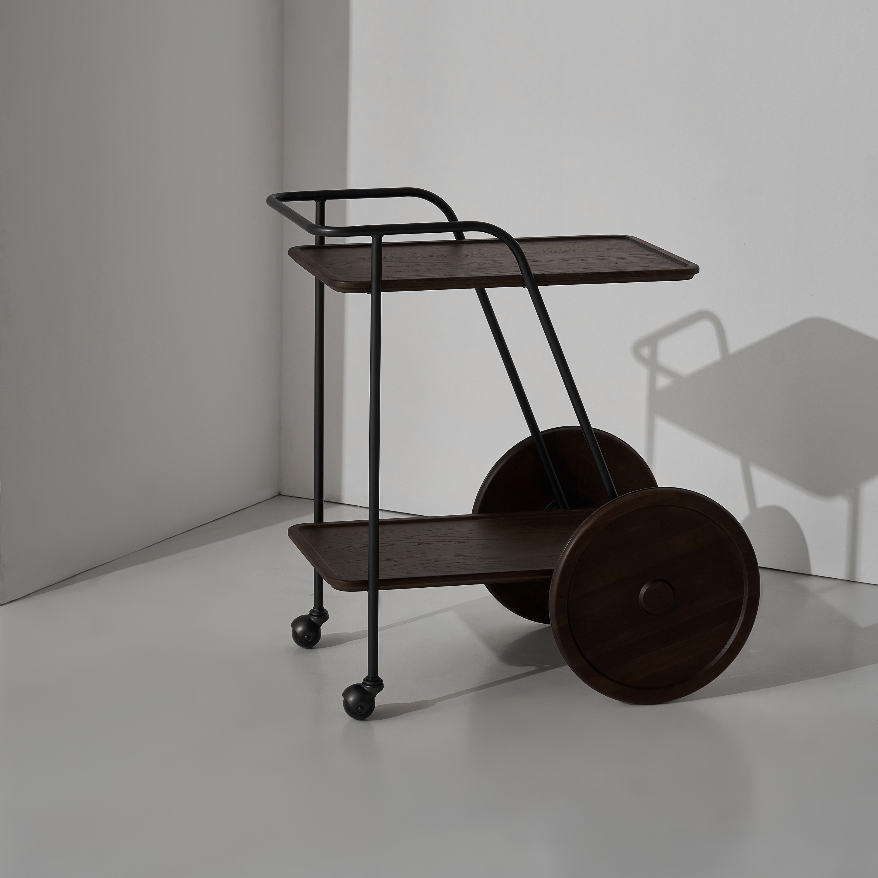 Distrikt trolley cart in smoked oak and black steel