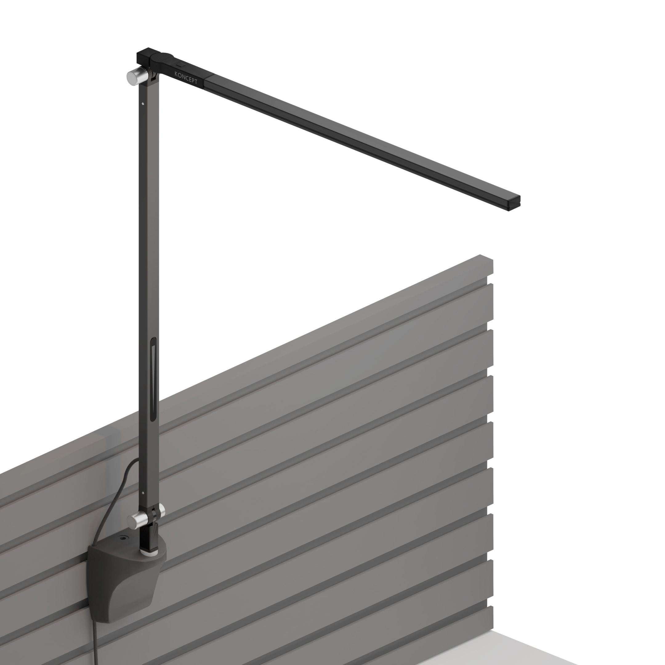 Mostra il prodotto Z-Bar Solo Desk Lamp with slatwall mount, Metallic Black del produttore Koncept