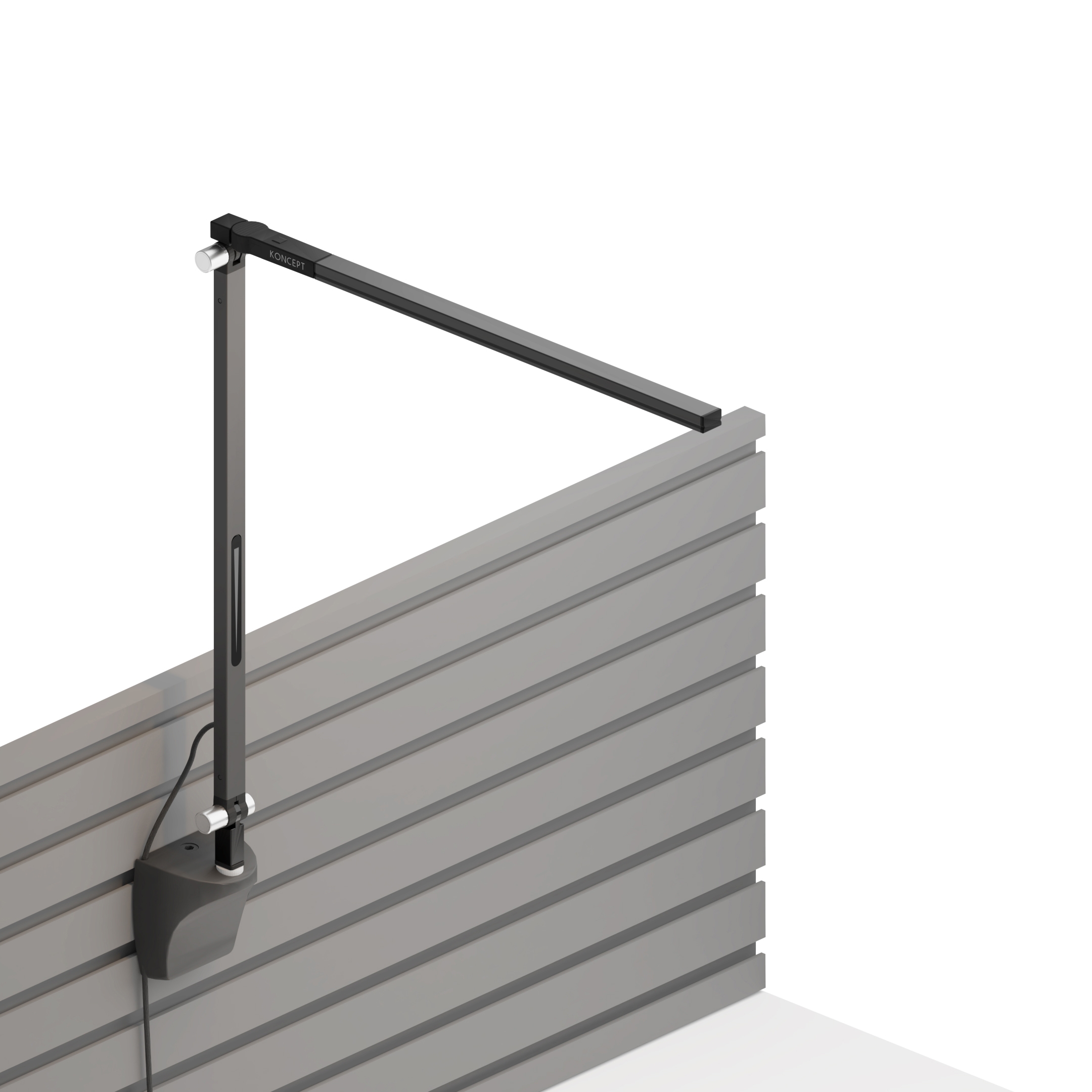 Mostra il prodotto Z-Bar Solo mini Desk Lamp with slatwall mount, Metallic Black del produttore Koncept