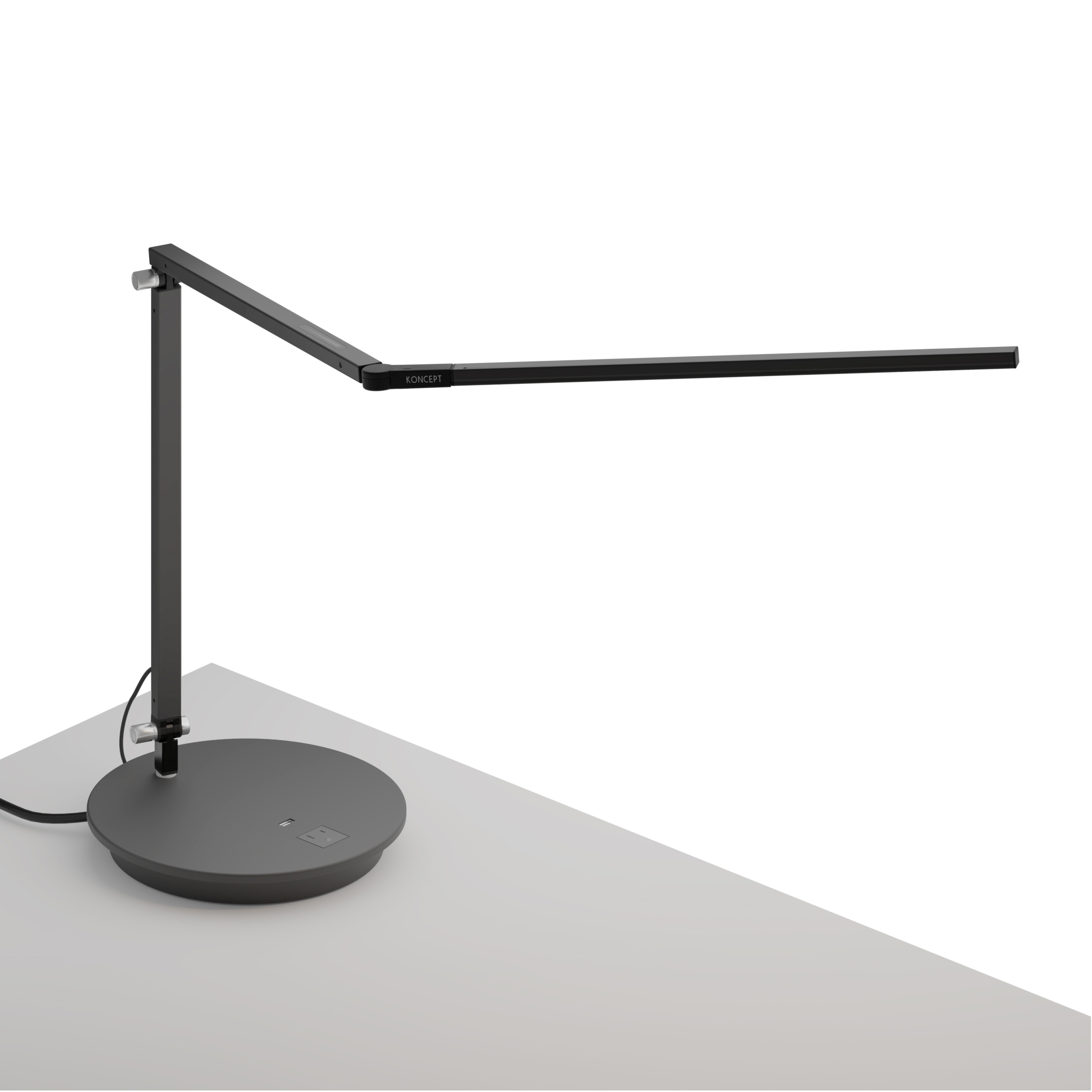 Mostra il prodotto Z-Bar Desk Lamp with power base (USB and AC outlets), Metallic Black del produttore Koncept
