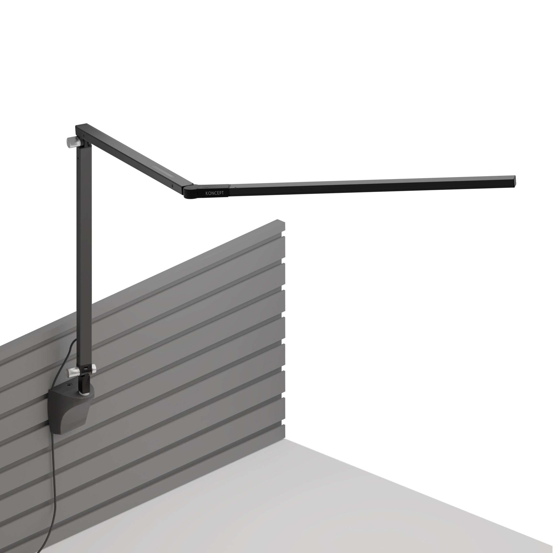 Mostra il prodotto Z-Bar Desk Lamp with slatwall mount, Metallic Black del produttore Koncept