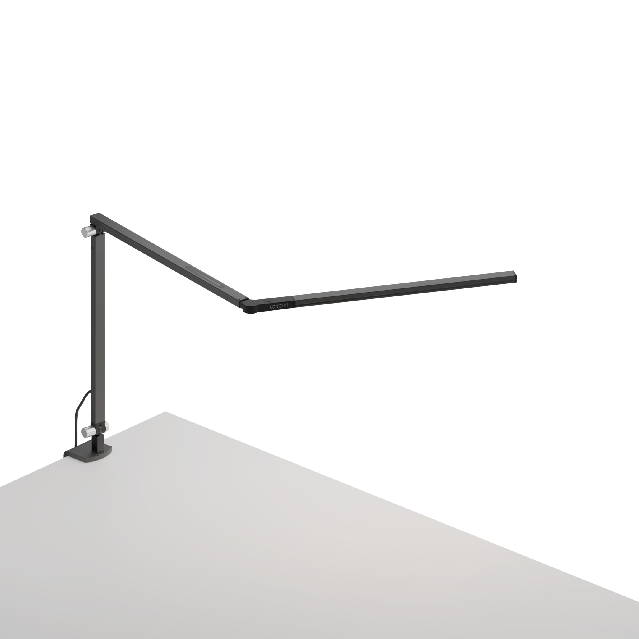 Mostra il prodotto Z-Bar mini Desk Lamp with one-piece desk clamp, Metallic Black del produttore Koncept