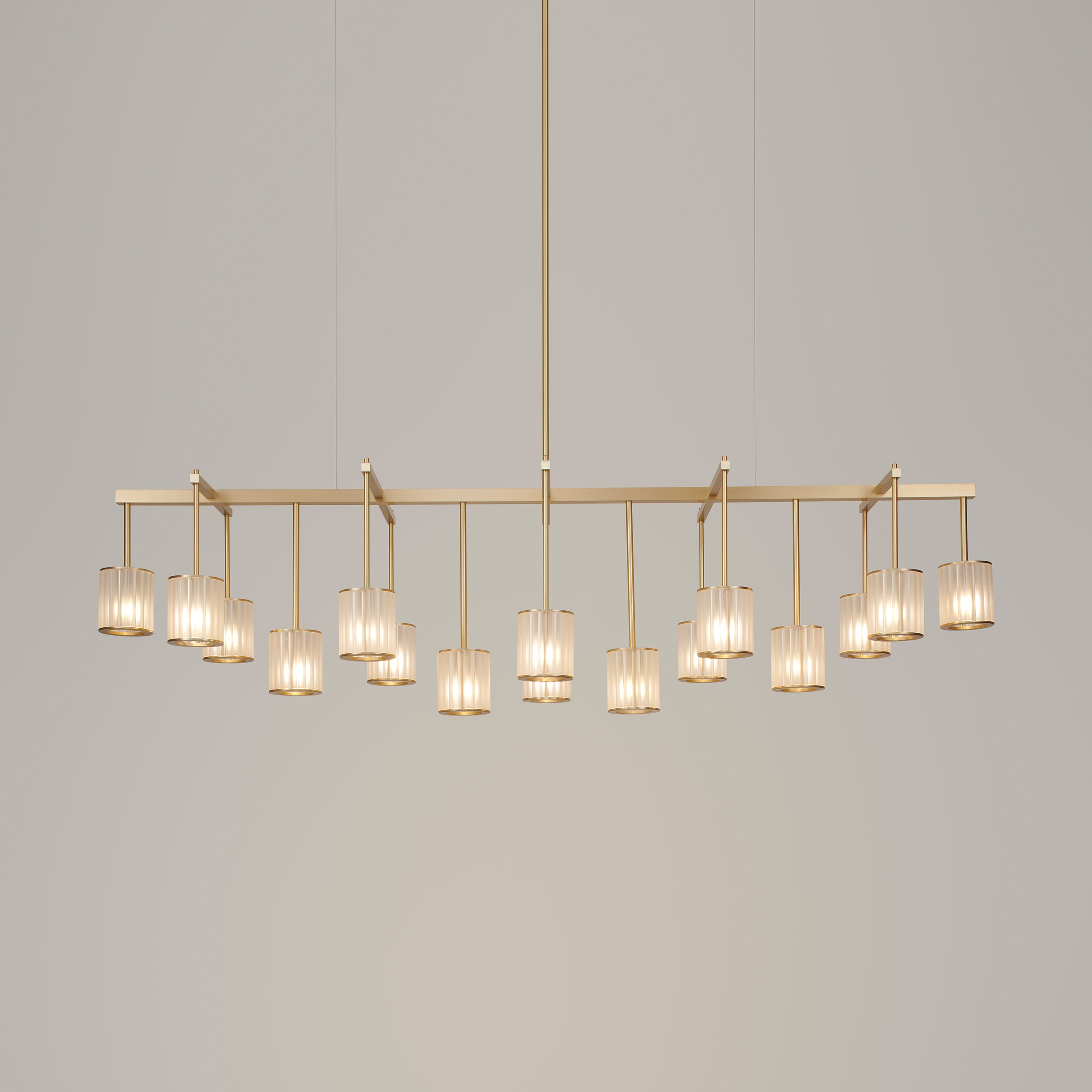 Display product Flute Beam Chandelier 16-arm brushed brass frosted glass from manufacturer Tom Kirk Lighting