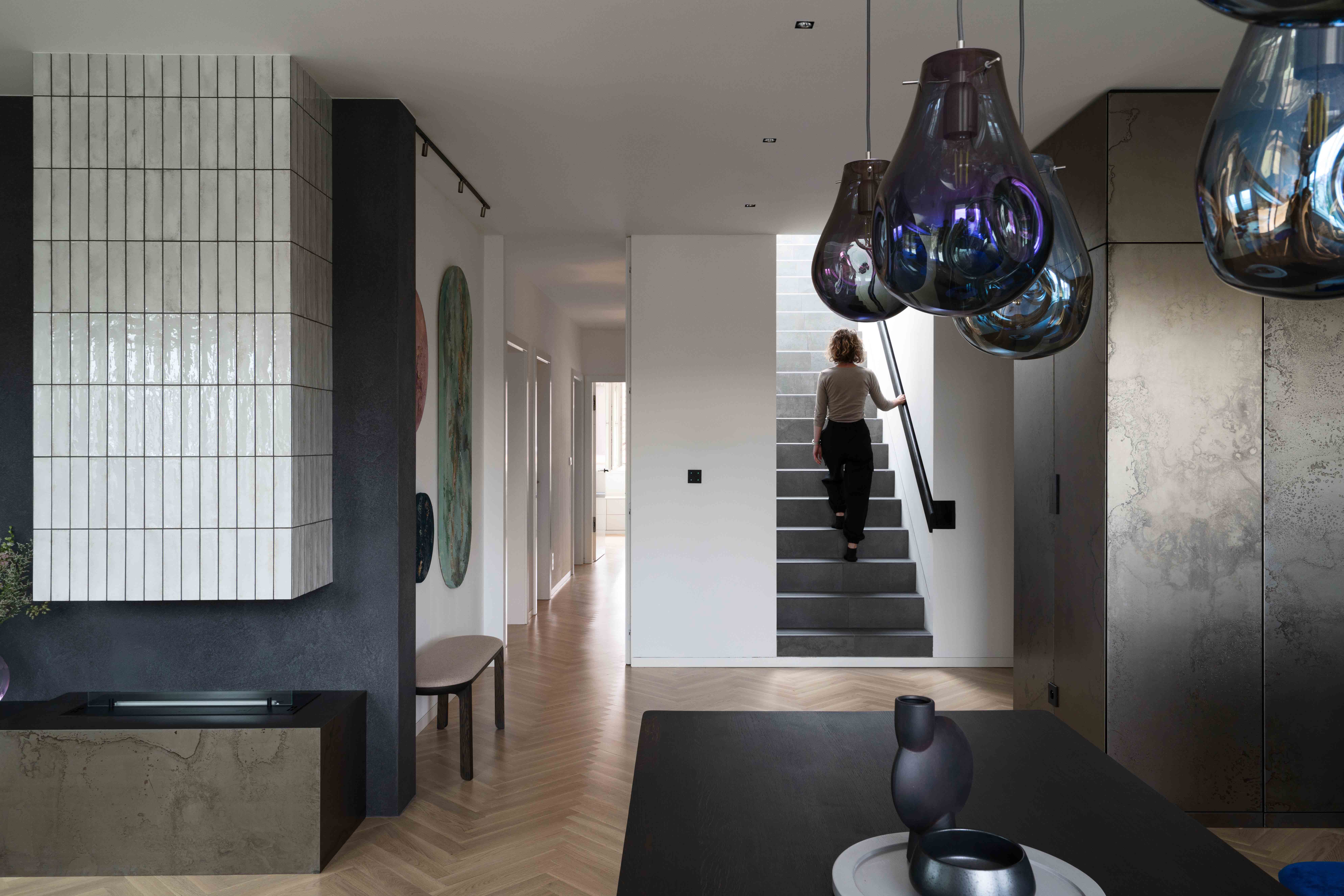 Read about project Prague Rooftop Apartment: A Home That Captures the Passage of Time