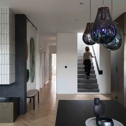 Read about project Prague Rooftop Apartment: A Home That Captures the Passage of Time