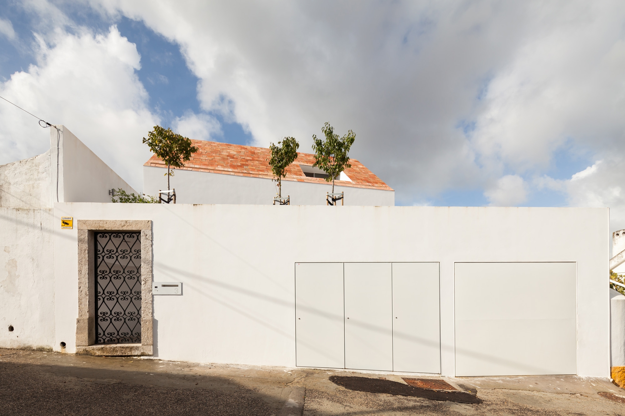 Read about project Three Courtyard House