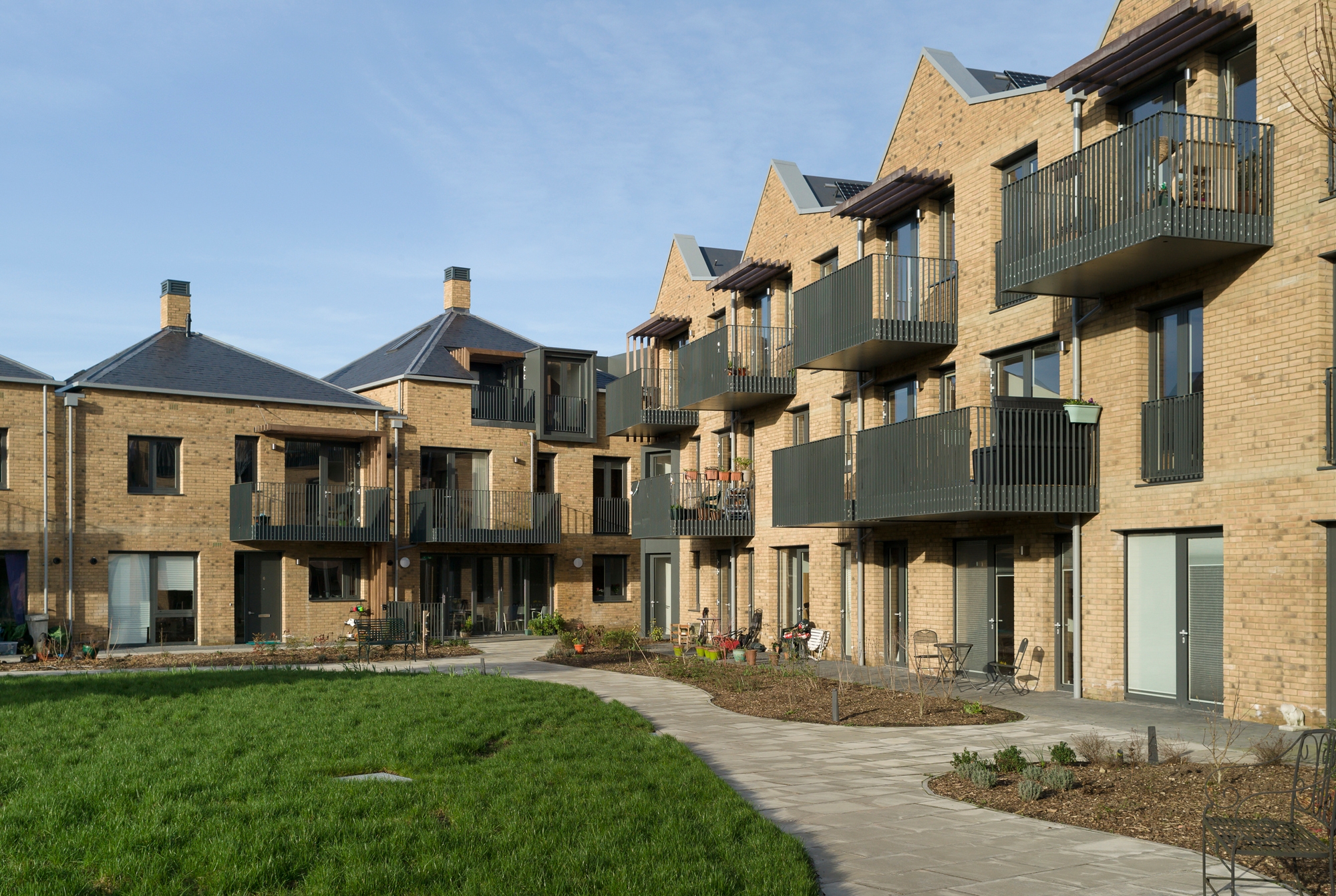 Erfahre mehr über das Projekt New Ground Cohousing