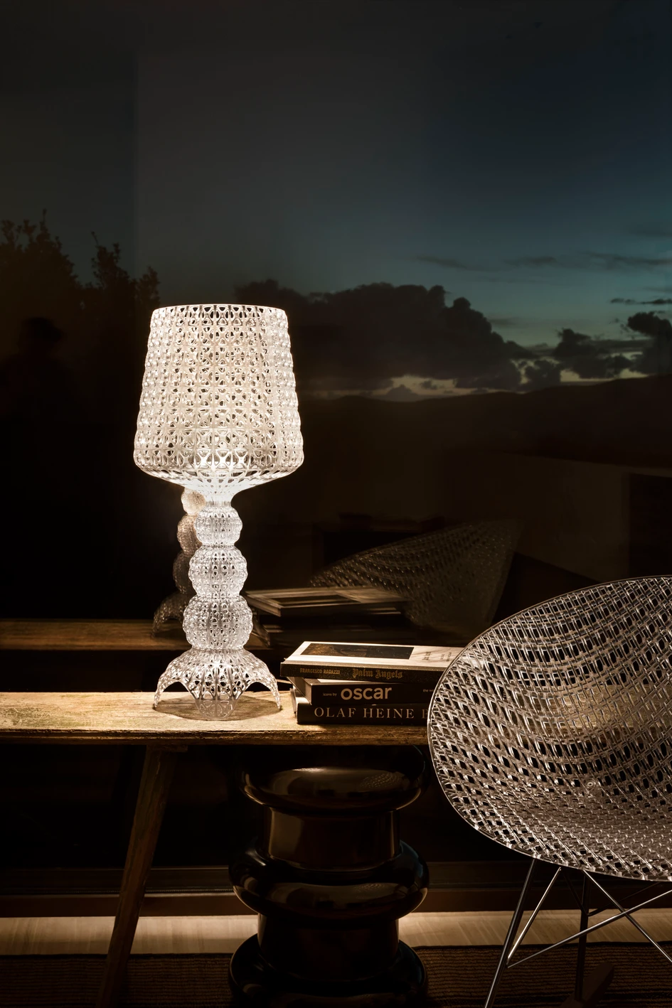 Kartell also produces lighting products such as the innovative Mini Kabuki table lamp by Ferruccio Laviani, which emits light through its perforated structure
